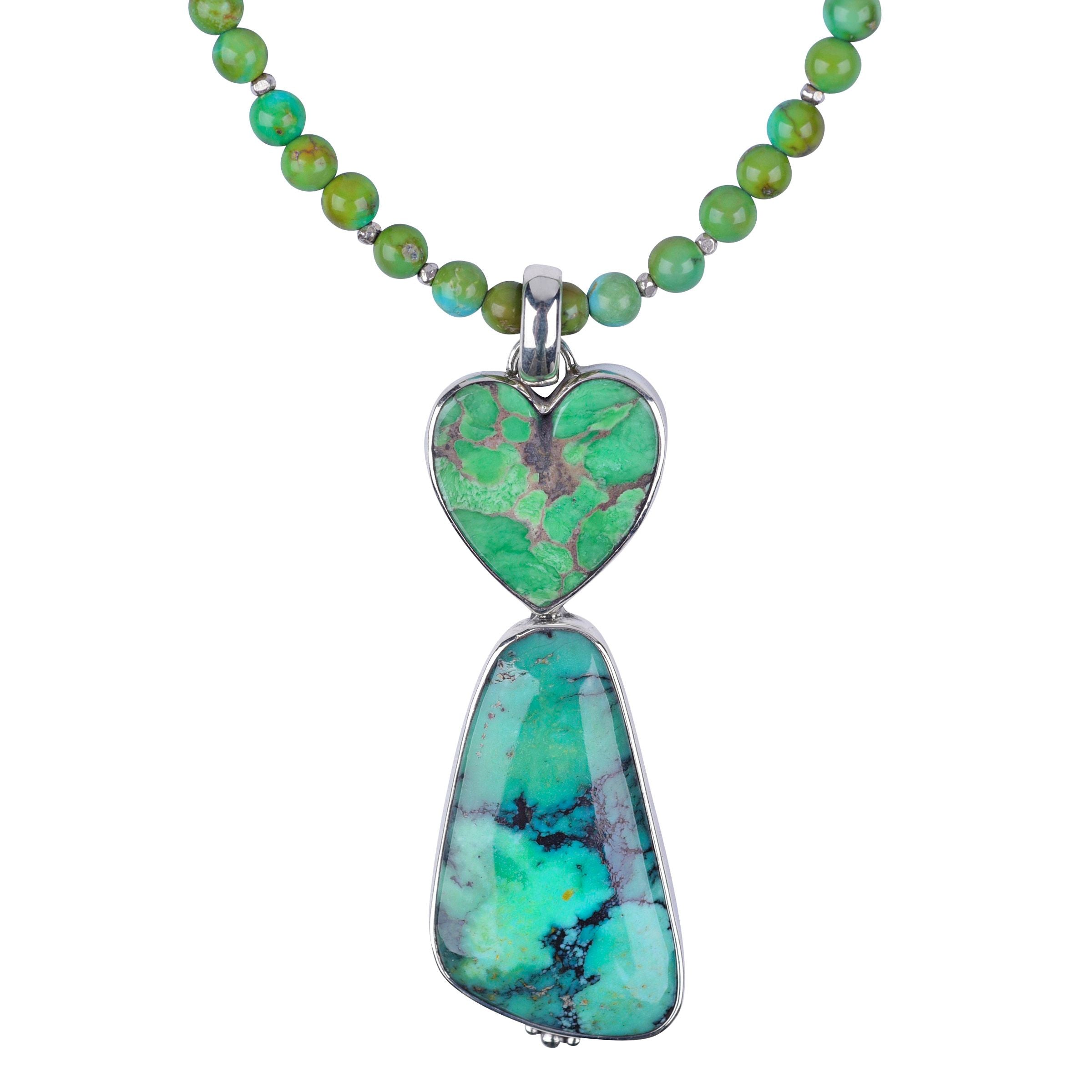 A Peyote Bird Original necklace that features sterling silver and green turquoise. With a unique green turquoise pendant. Made in USA.