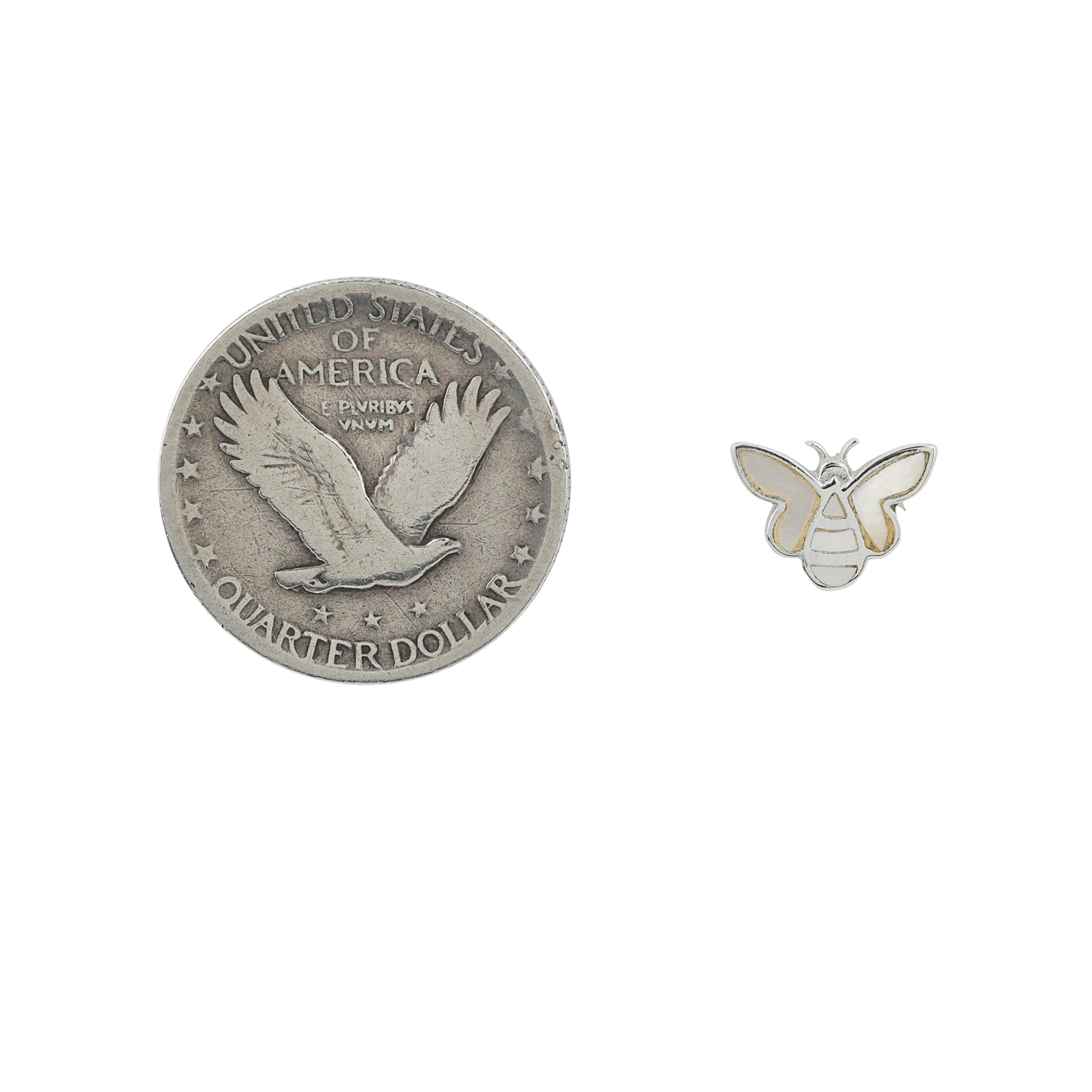 Sterling Silver bee stud earrings with mother of pearl inlay next to coin for scale