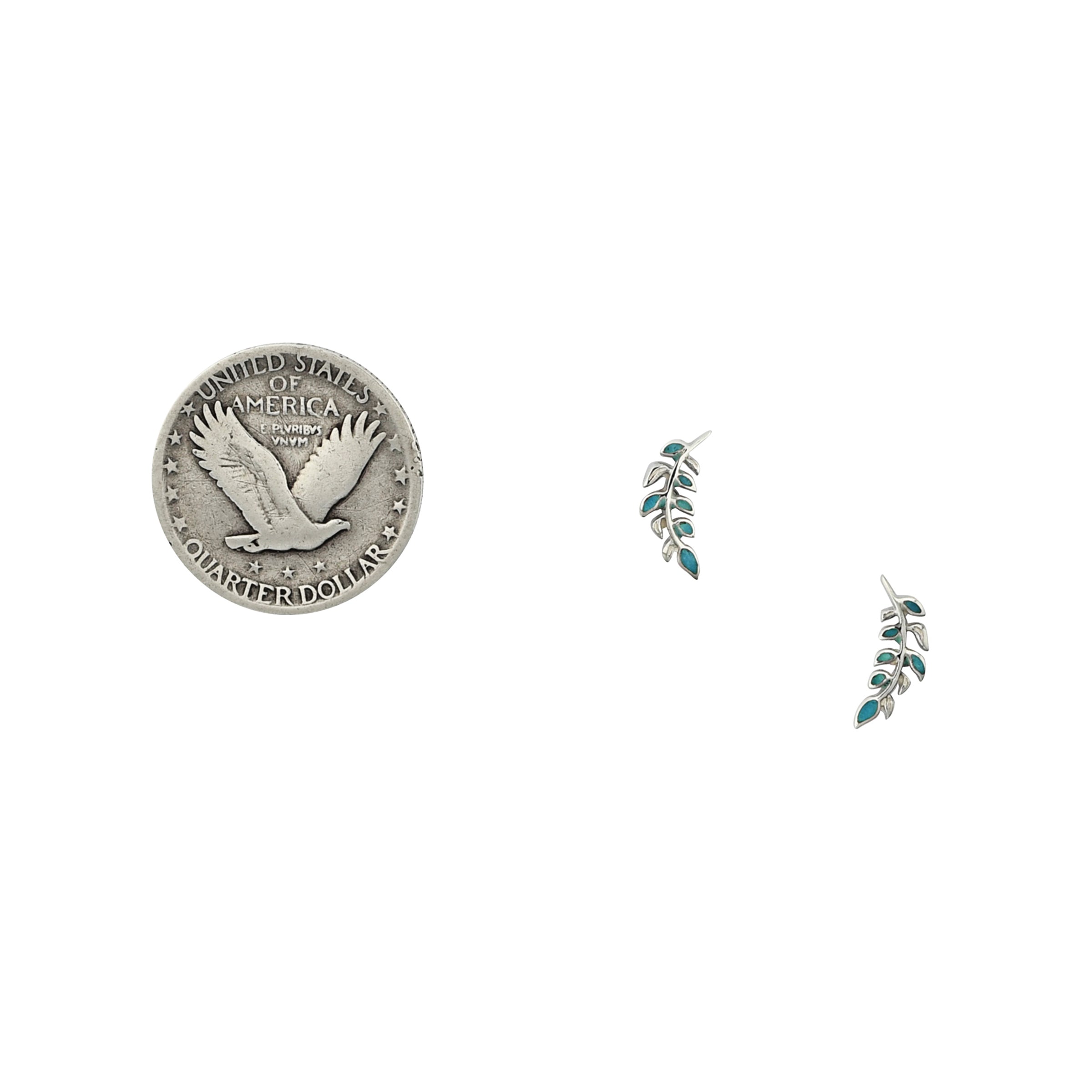 Sterling silver turquoise inlay earrings in leaf motif next to coin for scale.