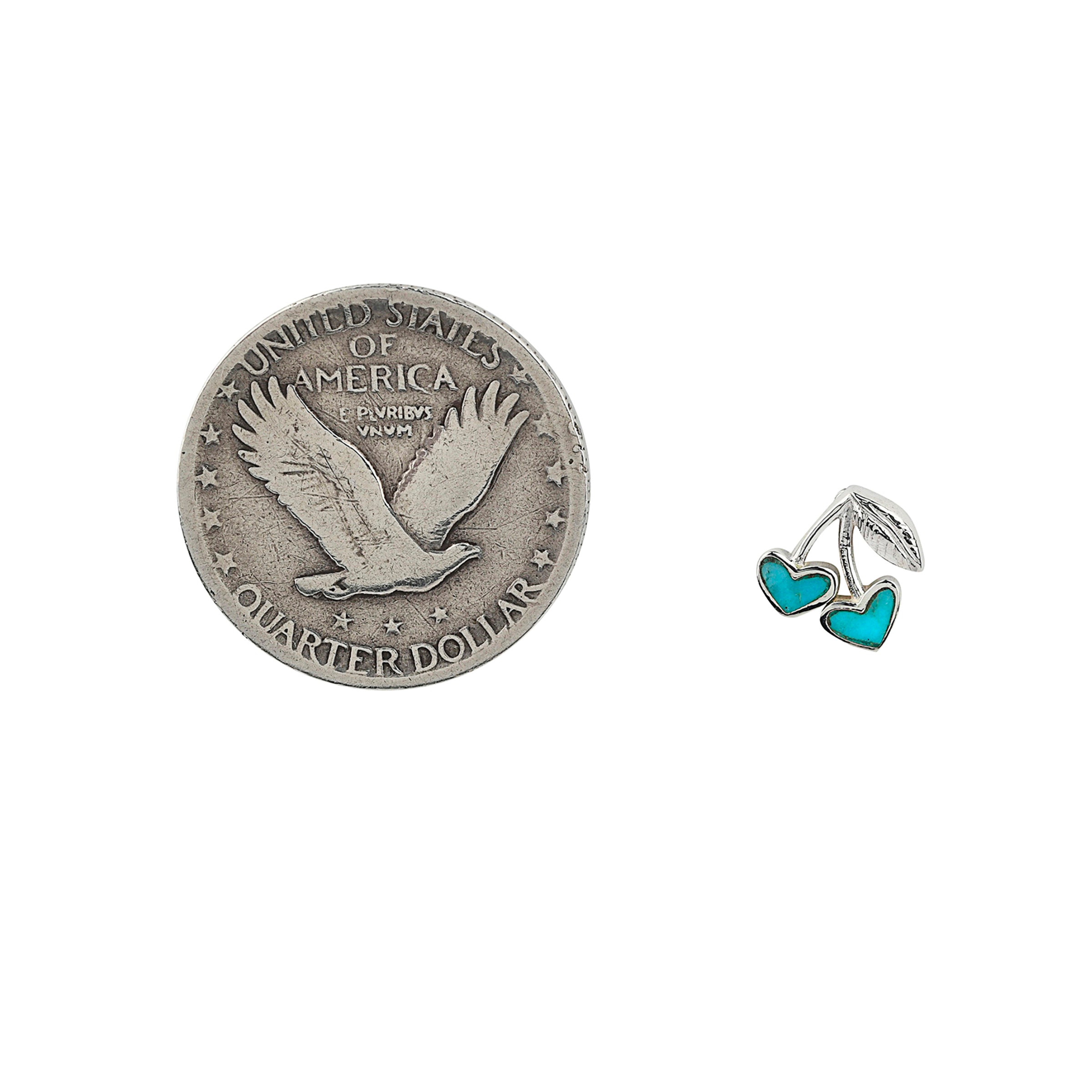 Sterling Silver cherry earrings with Turquoise stone inlay next to coin for scale.