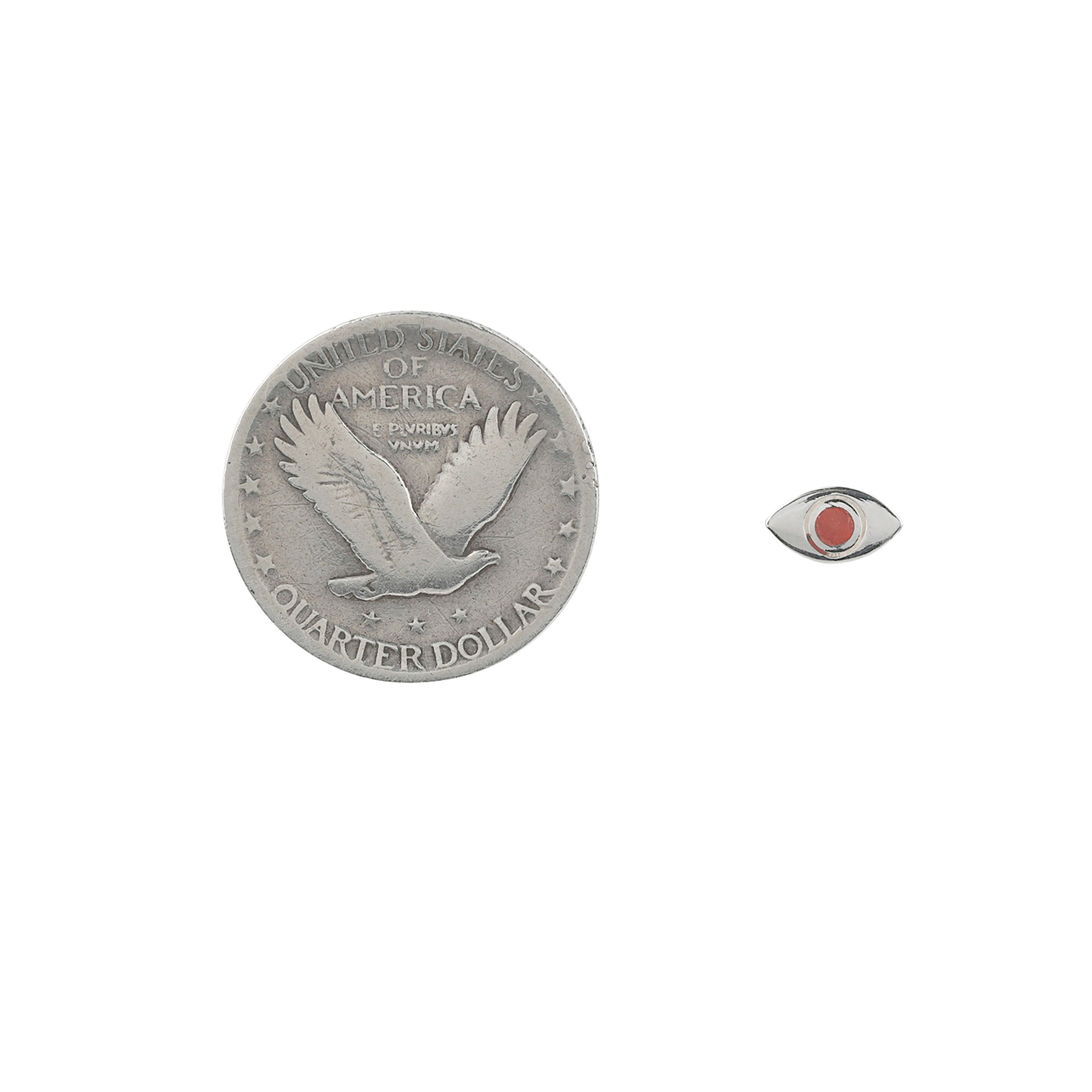 Pair of Sterling silver eye earrings with red coral inlay in iris area next to coin for scale.