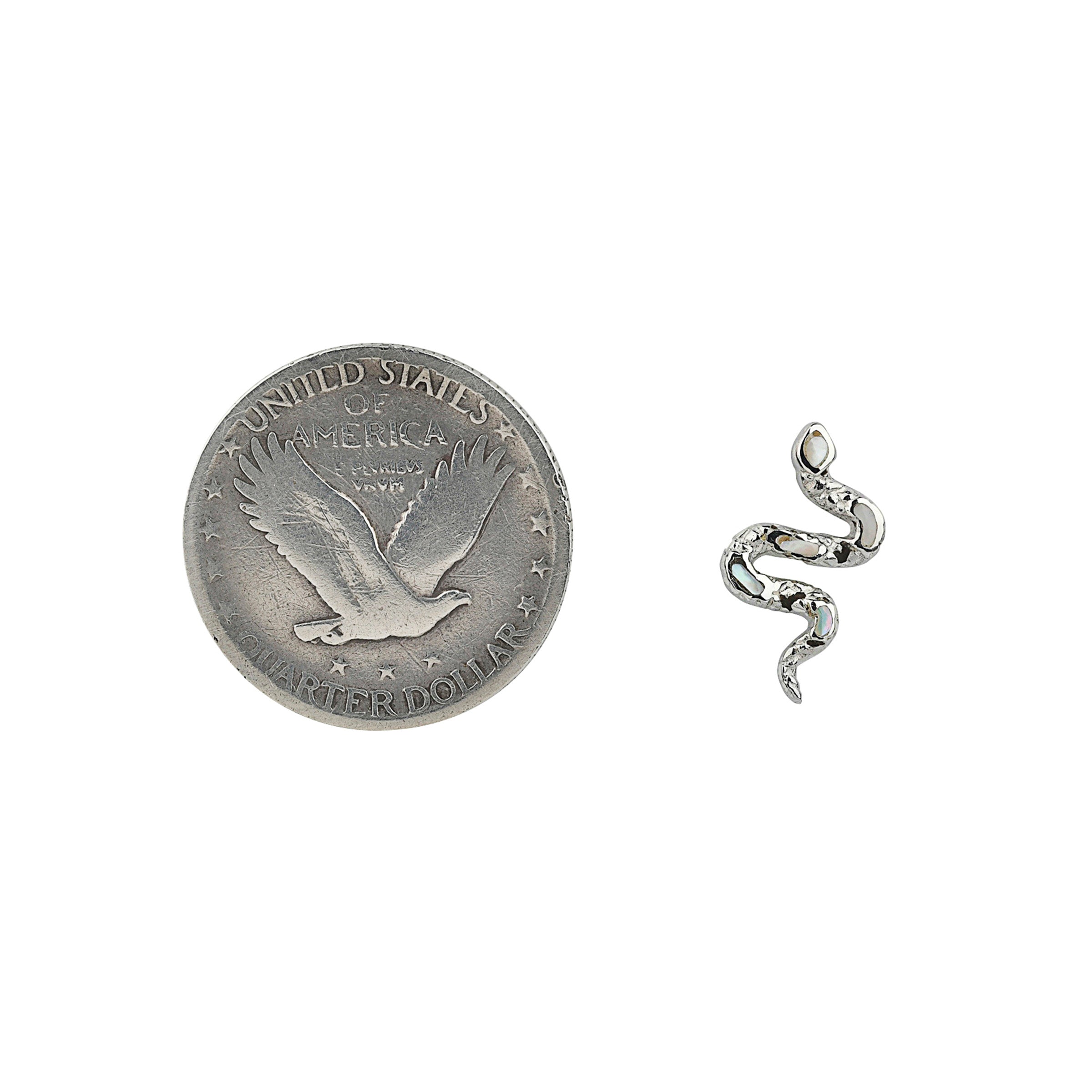 Textured Sterling Silver snake form earrings with mother of pearl stone inlay next to coin for scale.