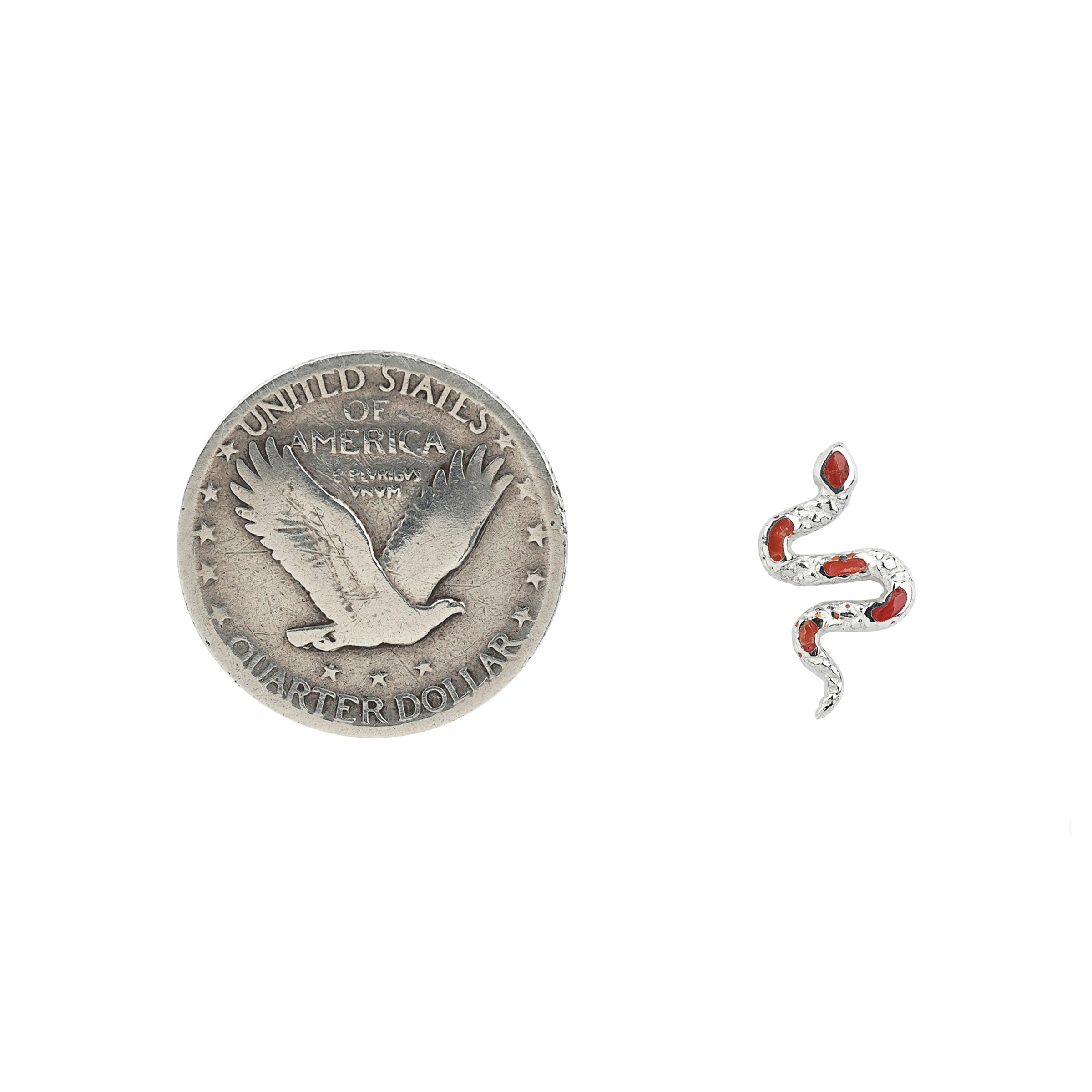 Textured Sterling Silver snake form earrings with Red Coral stone inlay next to coin for scale.