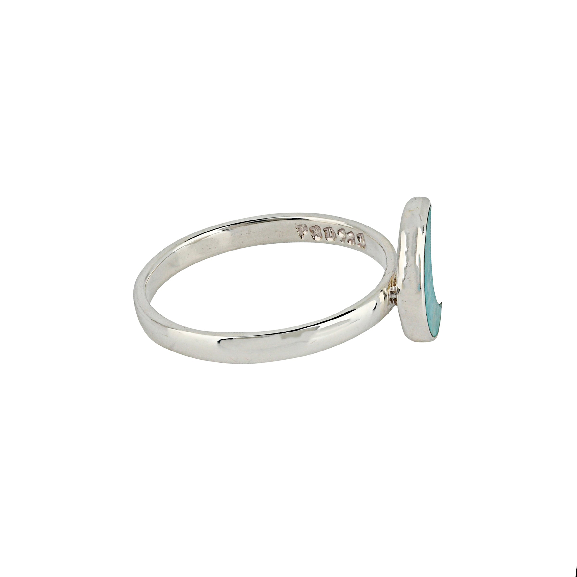 Sterling Silver band ring with crescent shaped moon design in turquoise stone side view.