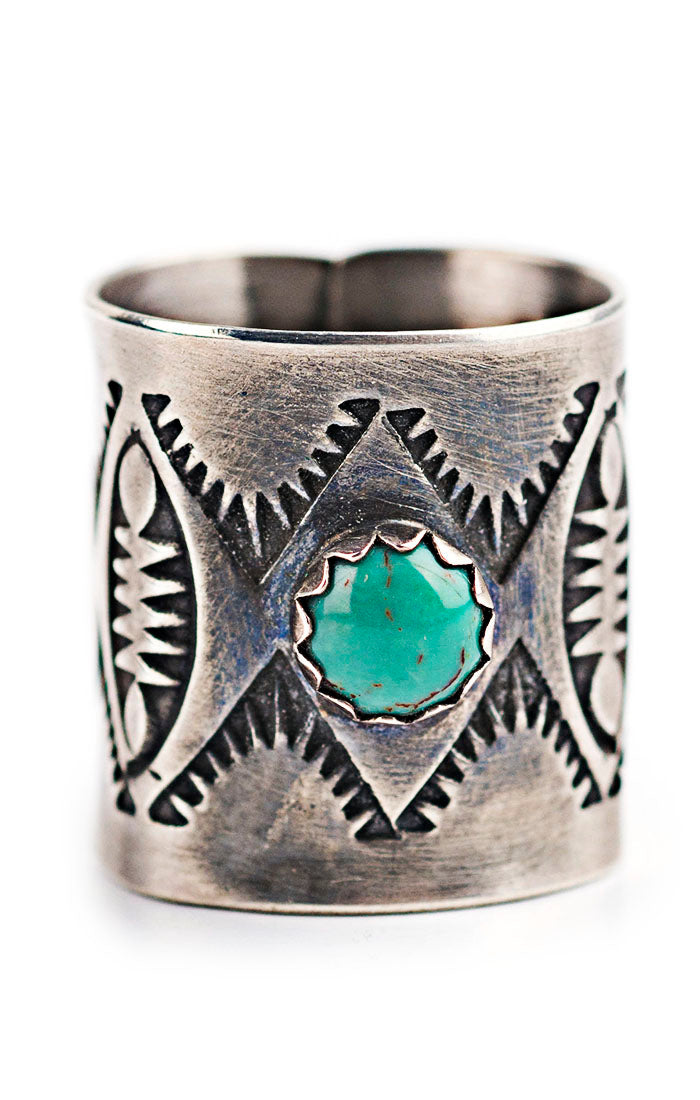 Beautifully handmade stamped sterling silver scarf slide topped with Blue Turquoise
