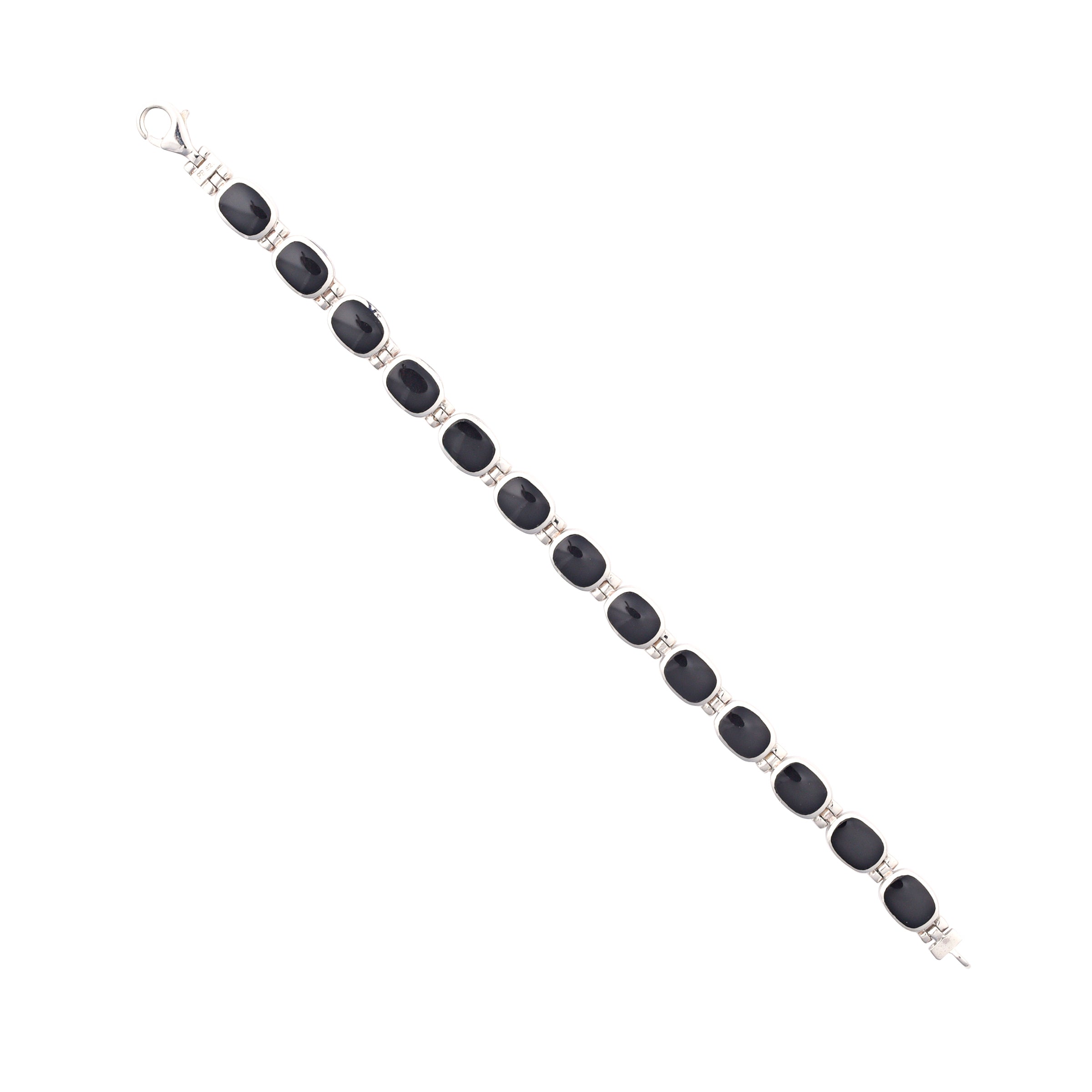 The Santa Fe link bracelet from the Bird and Arrow collection features sterling silver and beautiful onyx stones on one side and blue turquoise on the other side.