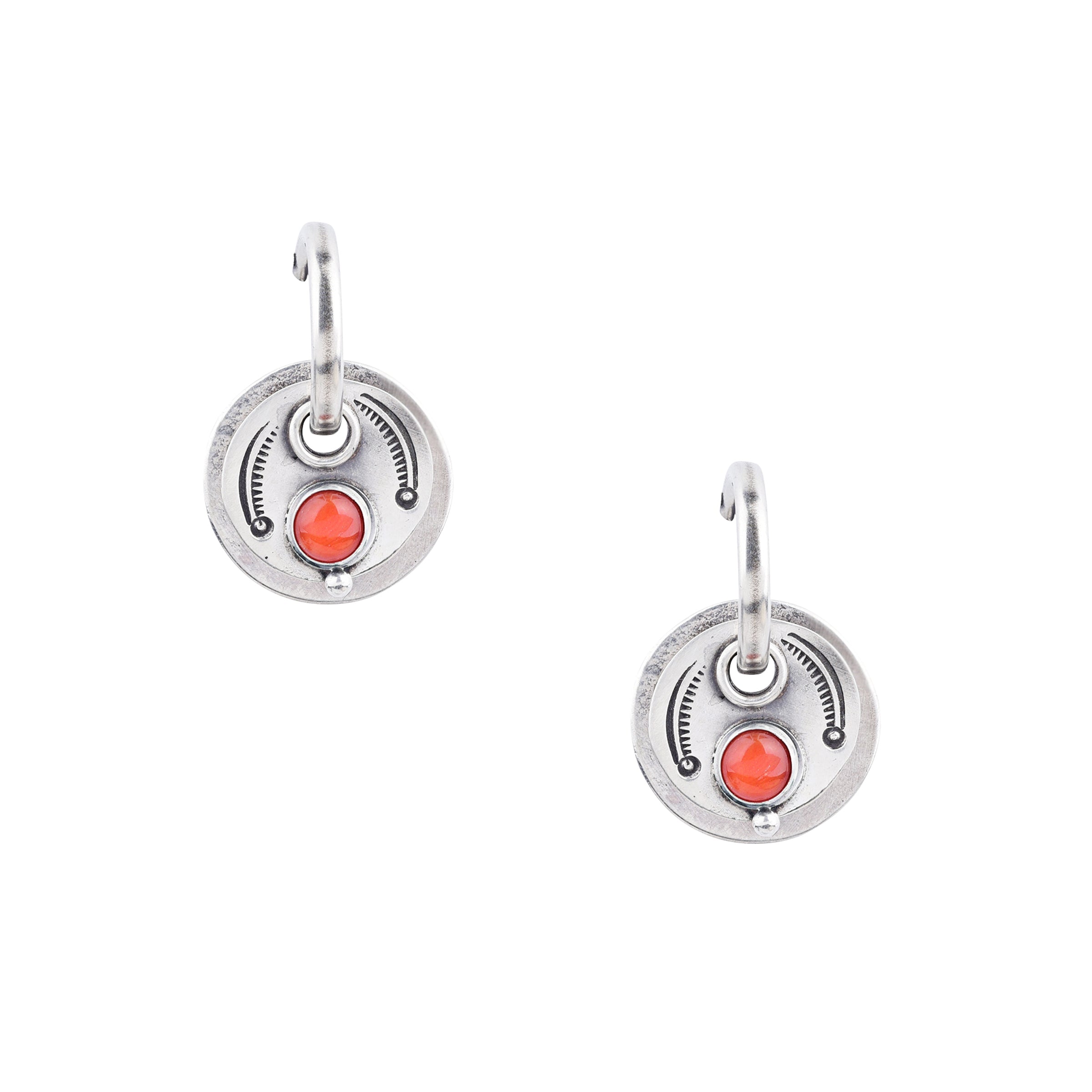 Handcrafted chic sterling silver earrings from artist Dennis Hogan. These southwest inspired earrings are highlighted by brilliant red coral.