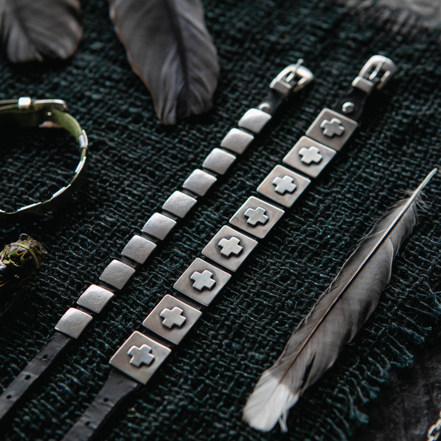 The Dennis Hogan Concho Bracelet features rich leather that wraps the wrist and sterling silver square conchos that echo traditional Southwestern design.