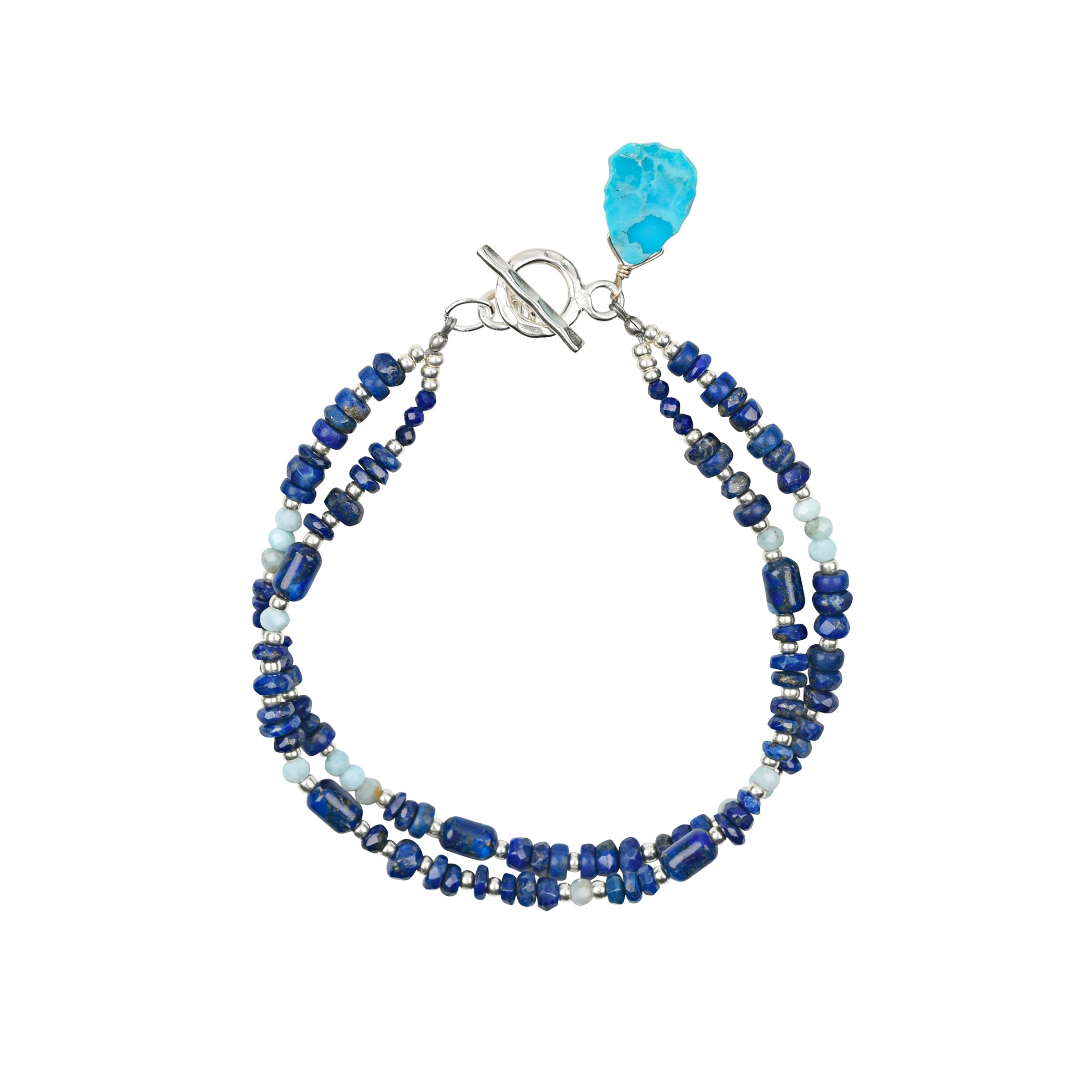 A multi-strand beaded bracelet strung with lapis, amazonite, and seed beads finished with a toggle clasp and a teardrop charm of blue turquoise