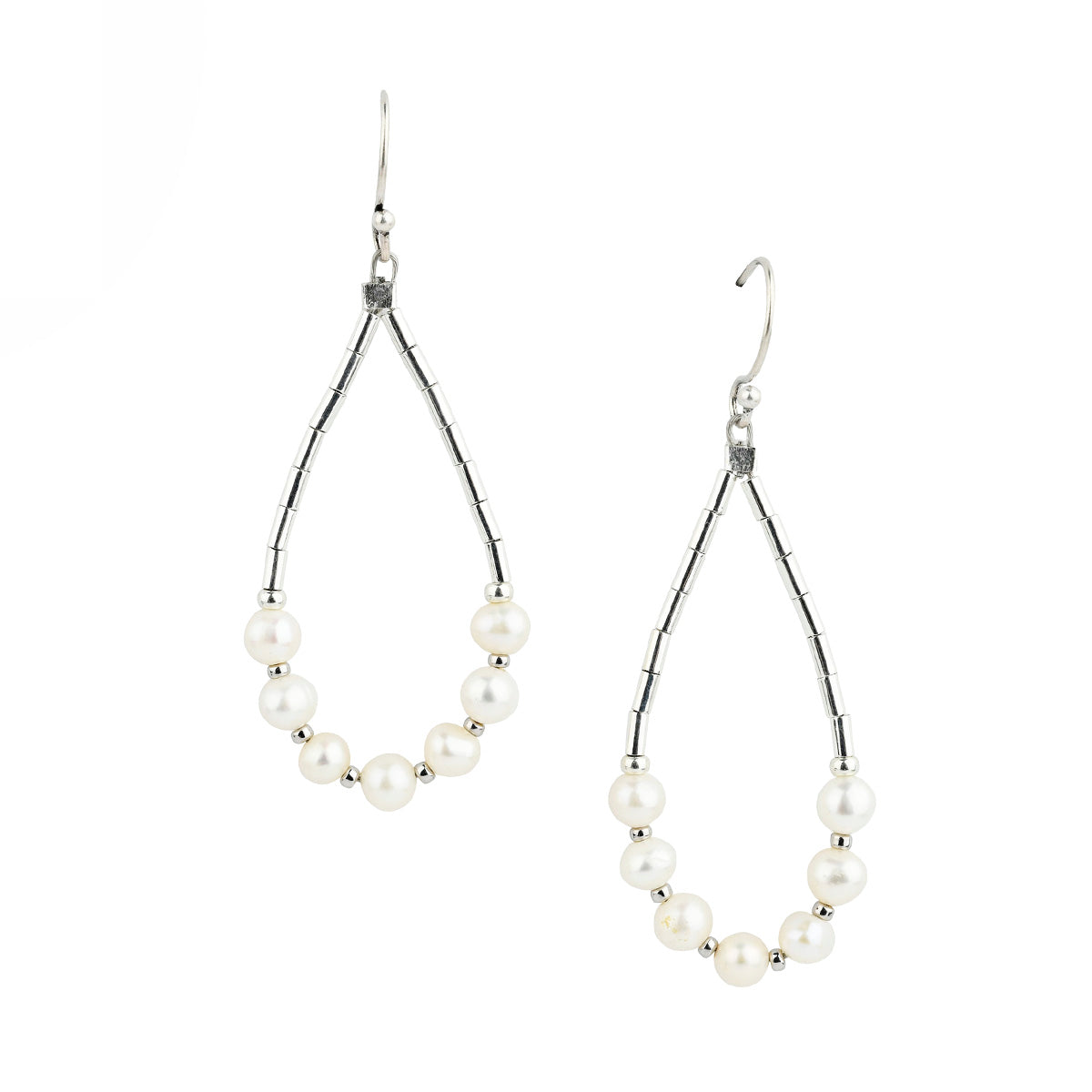 Pair of pearl drop earrings on a white background