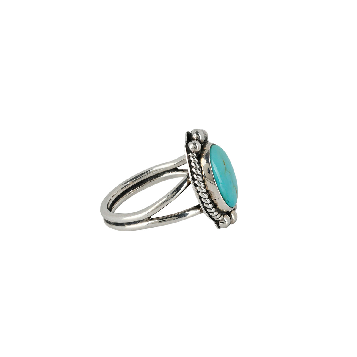 This ring was once a Sundance Catalog favorite - featuring Southwestern style motif in Sterling Silver and Blue Turquoise.