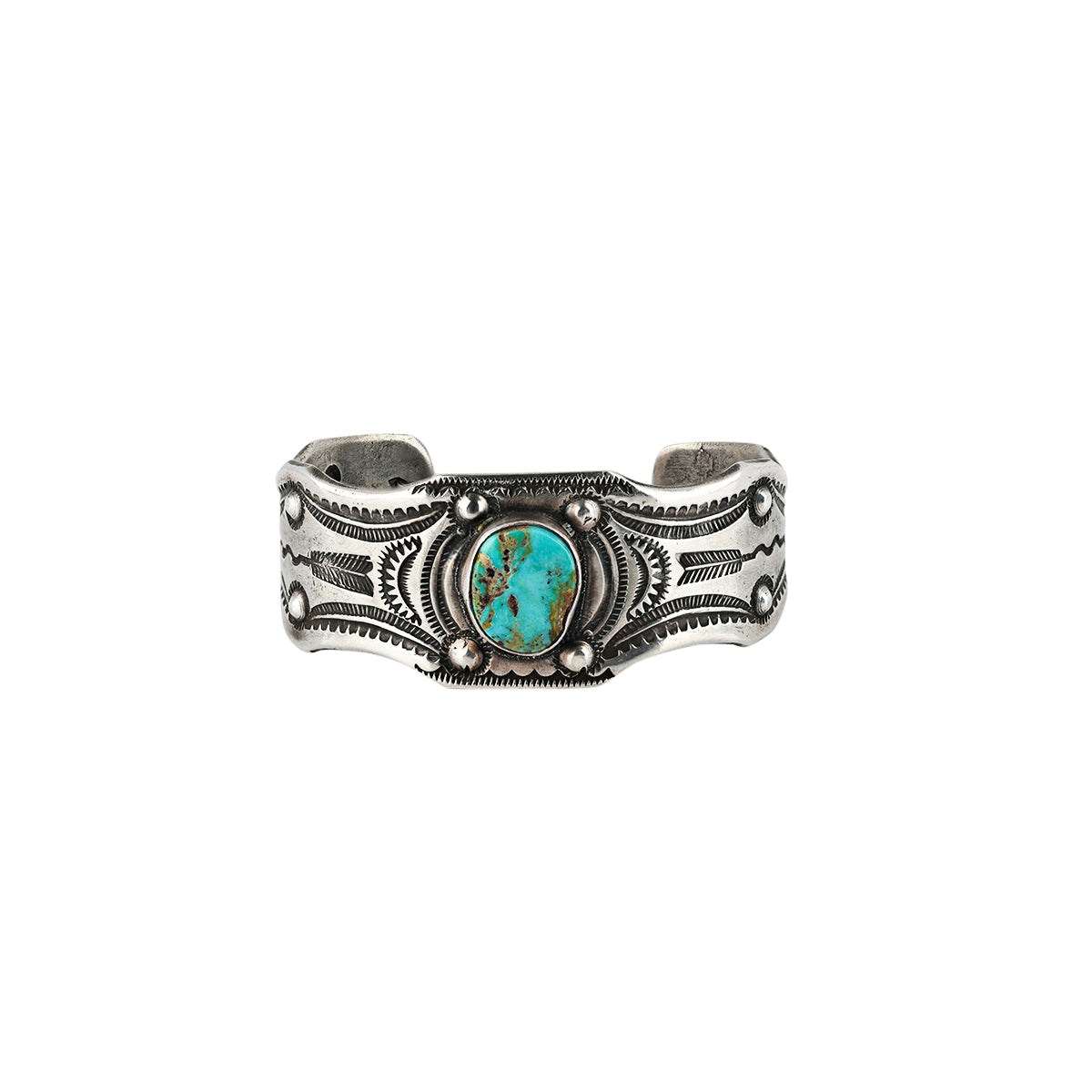 Silver cuff featuring blue turquoise in the middle of the cuff surrounded by southwestern design and arrows