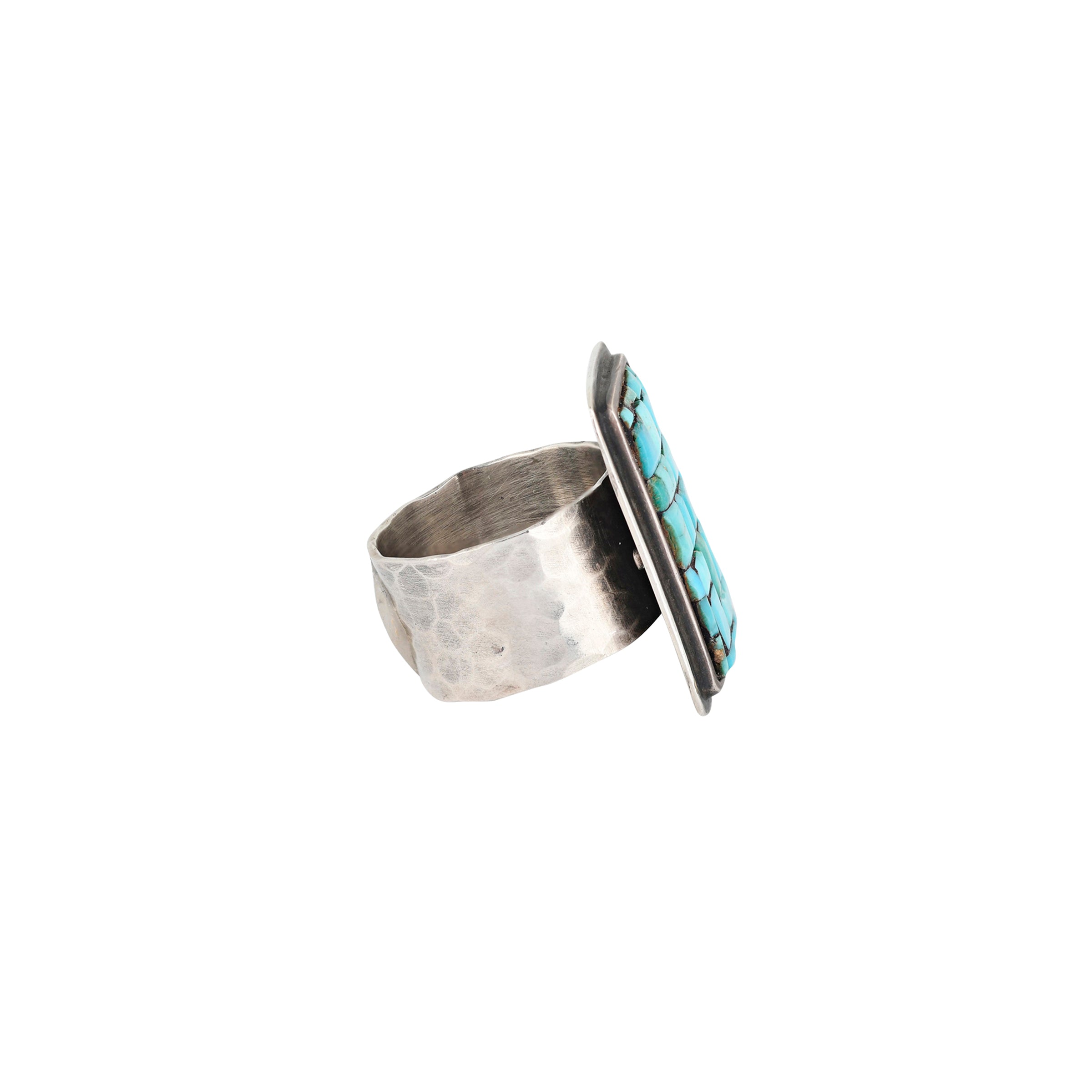 A mosaic ring made with Sterling Silver and Turquoise. Previously featured in the Sundance Catalog