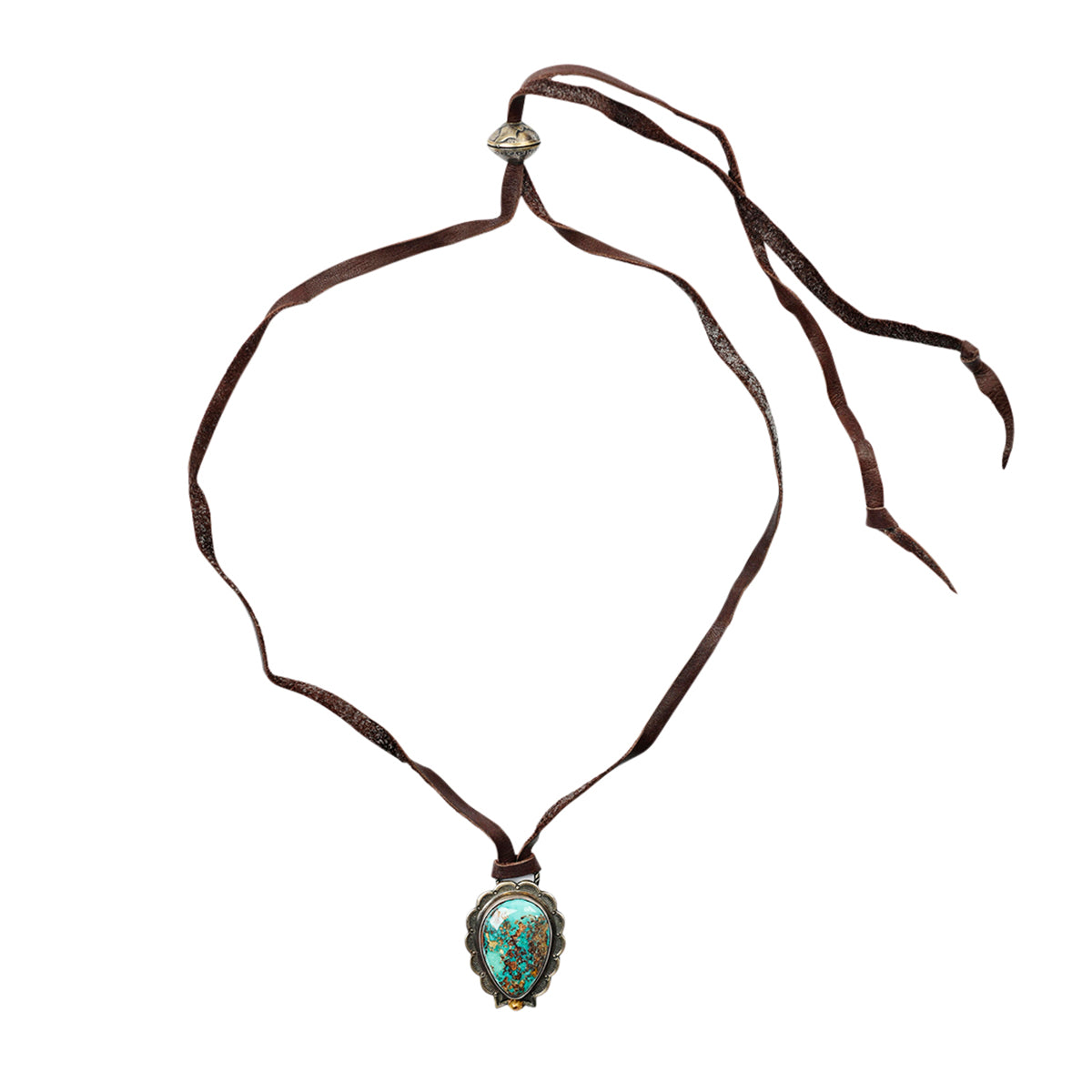 A Sundance Catalog favorite, this necklace features a pendant of Blue Turquoise stone set in Sterling Silver, strung on deerskin leather topped with a slider bead for an adjustable fit.