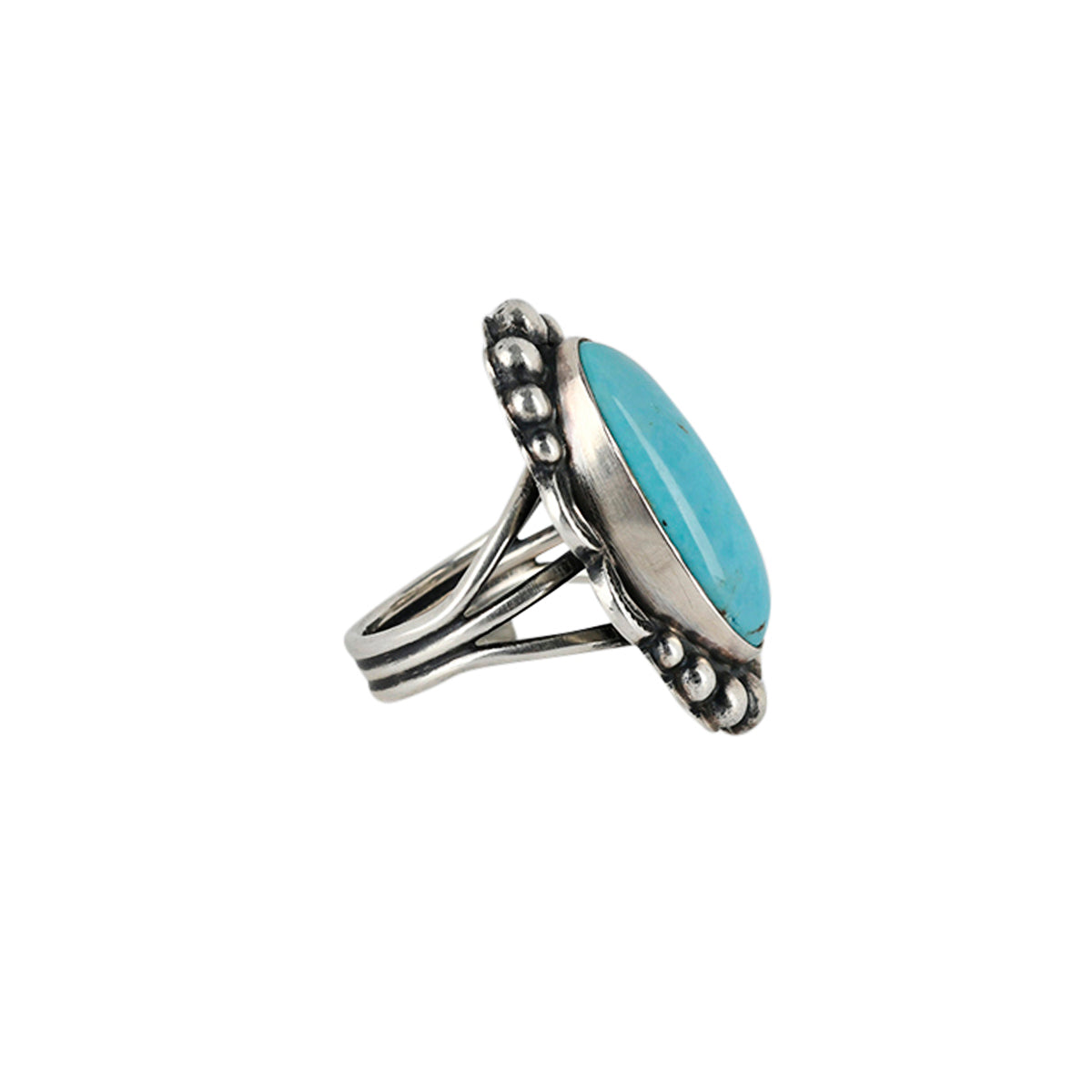 Santa Fe style ring featuring a blue turquoise stone at the center