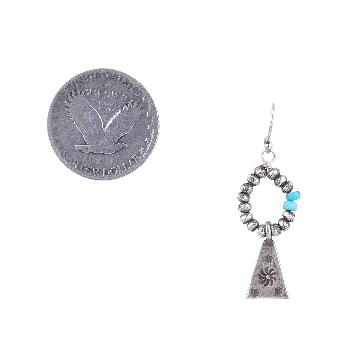 Thai stamped charm on Thai silver bead hoops with Turquoise bead accent earring next to coin for scale