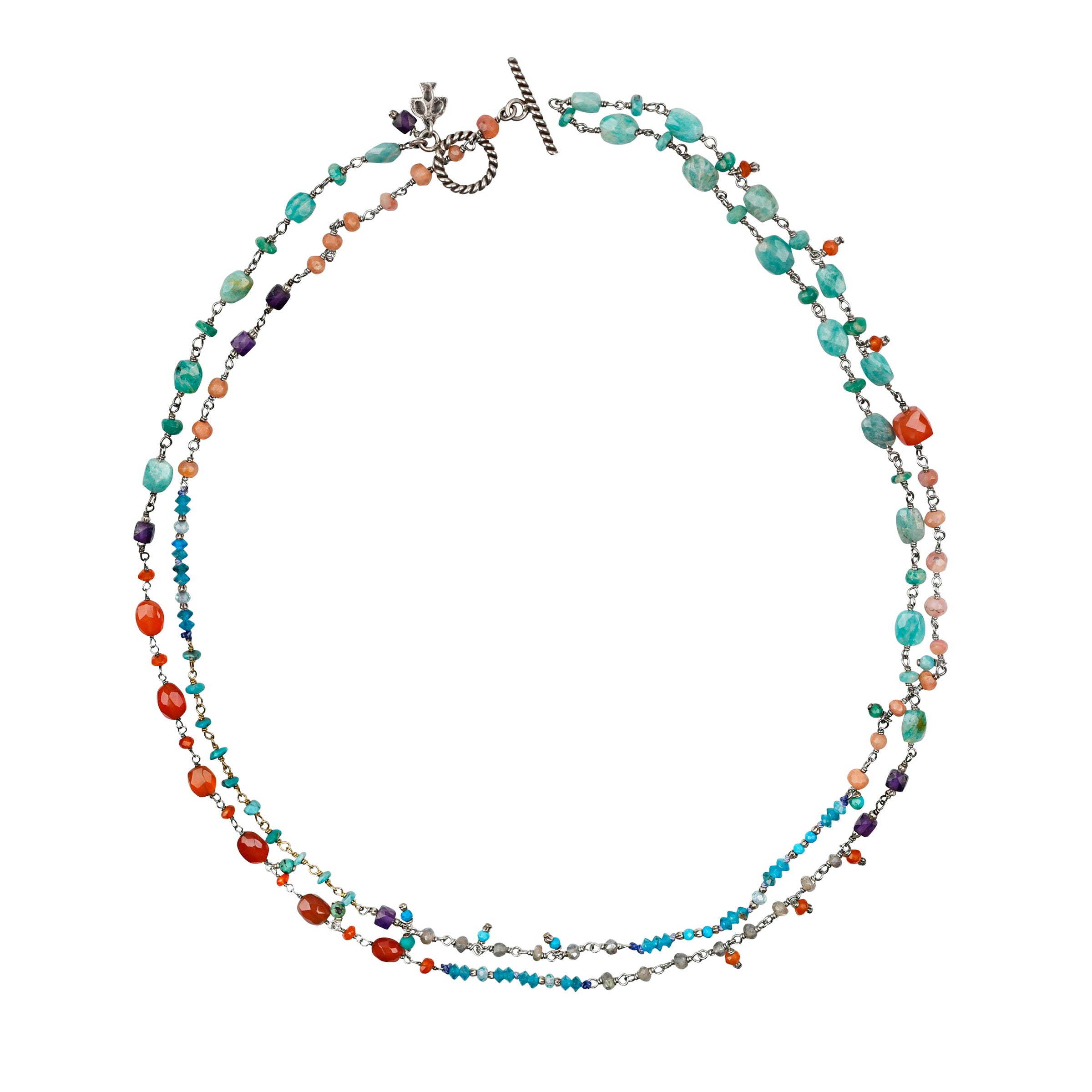 As seen in the Sundance Catalog, the Color Coded Necklace is a medley of gemstone beading including: Carnelian, Turquoise, Amethyst, Red Onyx, Amazonite, Apatite, Labradorite, Howlite