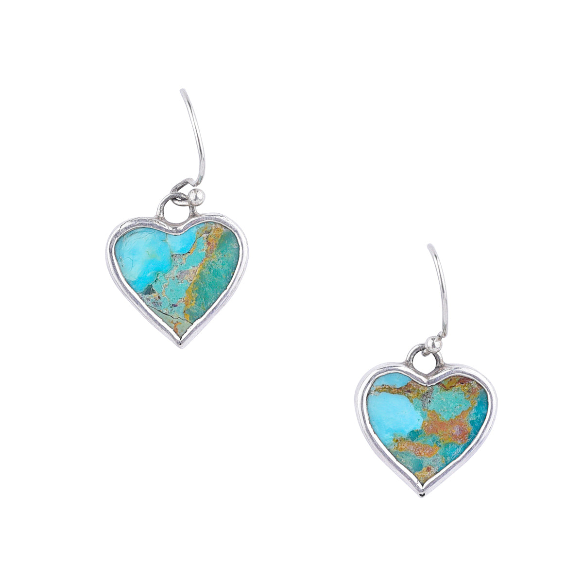 Turquoise stone wrapped in sterling silver in heart shape earrings.
