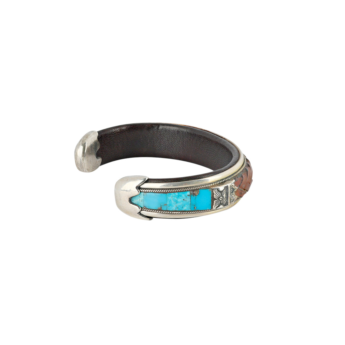 Turquoise and leather cuff side view with sterling silver terminals