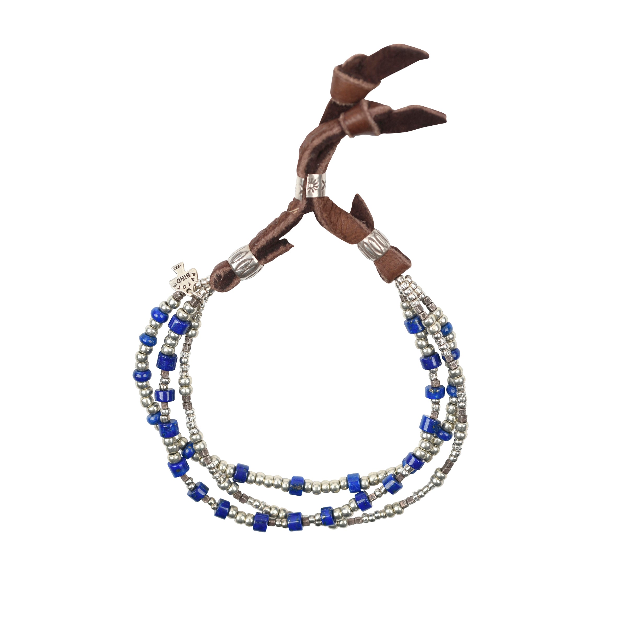 A three strand bracelet strung with Sterling Silver and Lapis Lazuli beading tied together with soft deerskin leather and topped with a stamped Sterling Silver slider bead for an adjustable fit.
