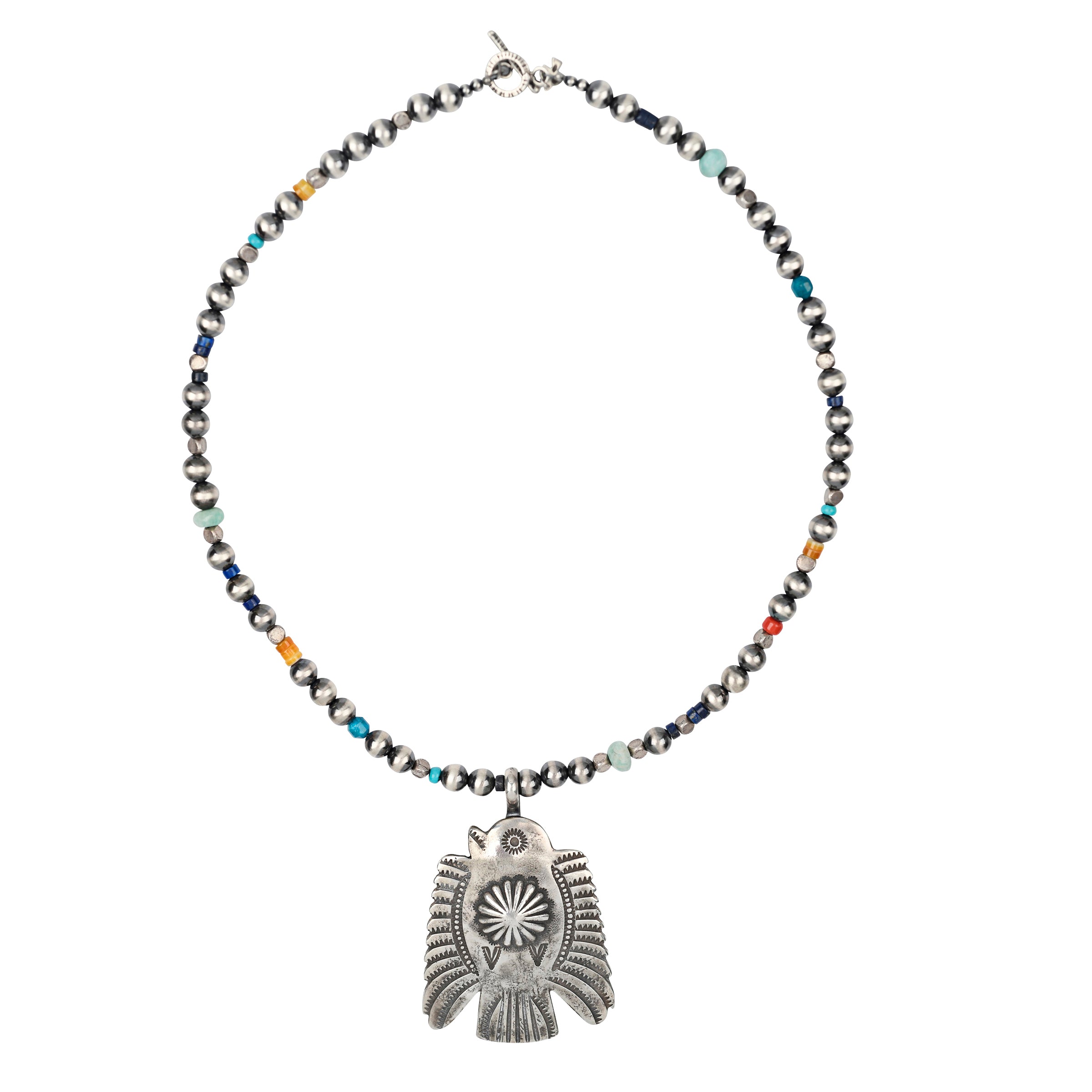 A bold Thunderbird Pendant strung with Desert Pearls, Lapis, Mother of Pearl, Coral, Amazonite, Turquoise, and Apatite. This piece was featured in the Sundance Catalog, but now you can find it h ere at Peyote Bird Designs!