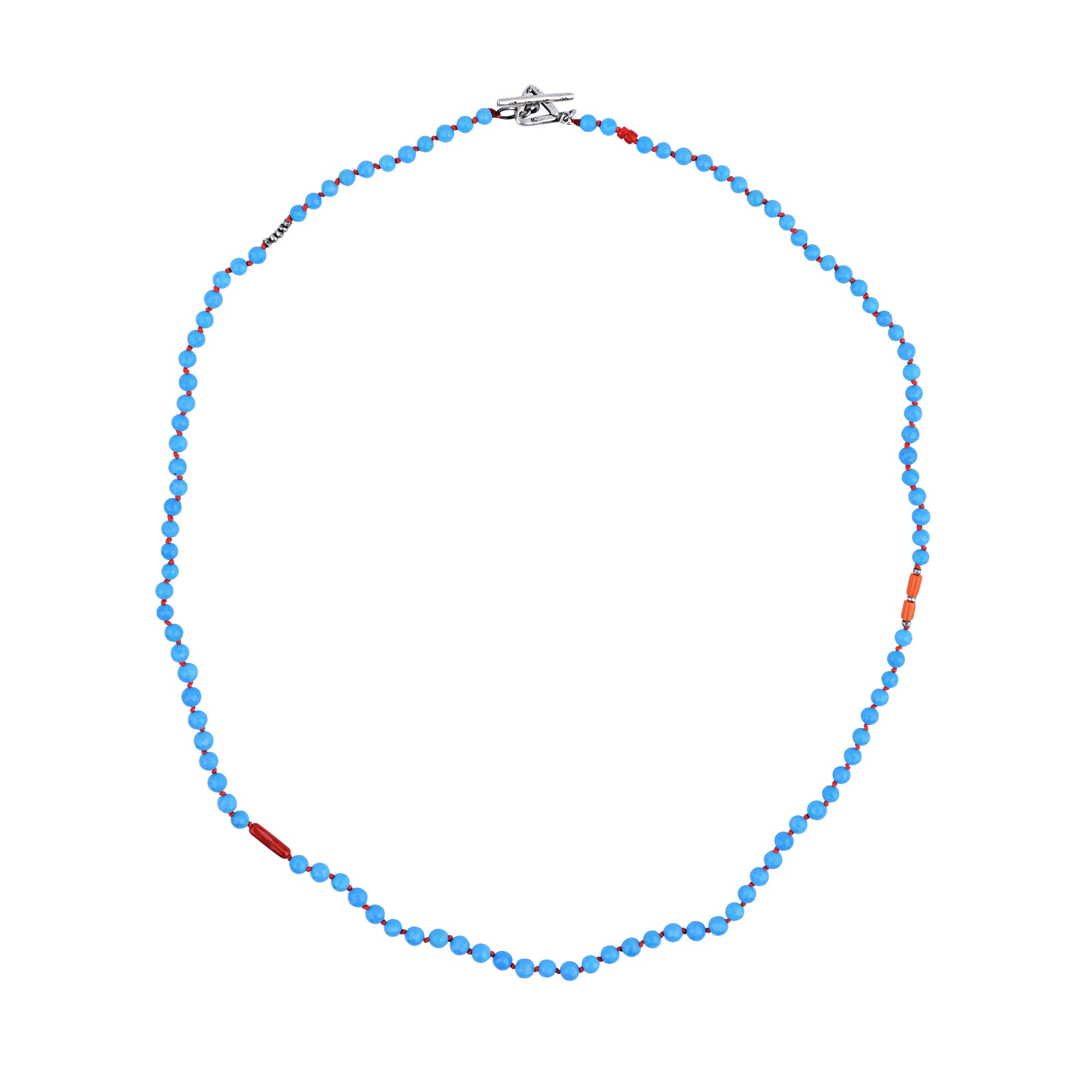 This beautifully handcrafted necklace is strung with Blue Turquoise, Coral, and Sterling Silver Thai beading.