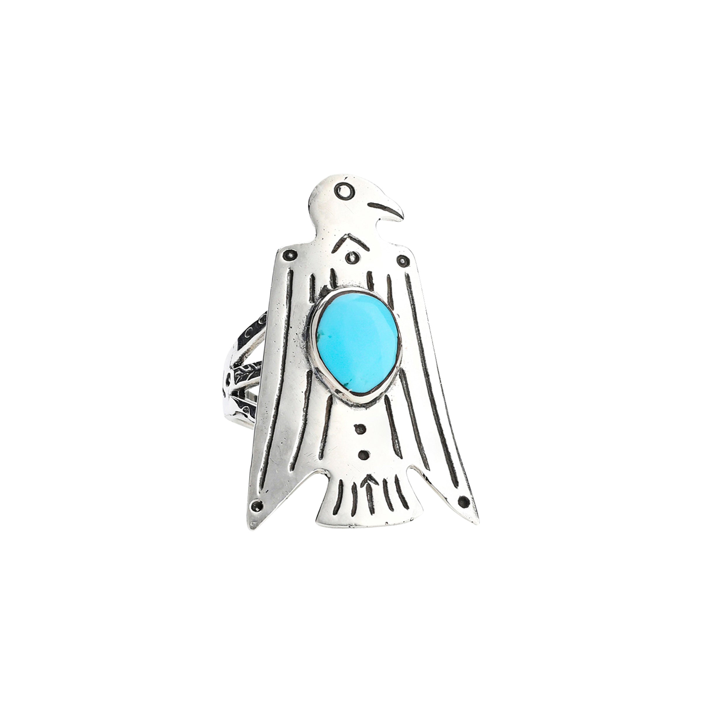 A shield ring of a large eagle with Blue Turquoise as the centerpiece with stamped detailing