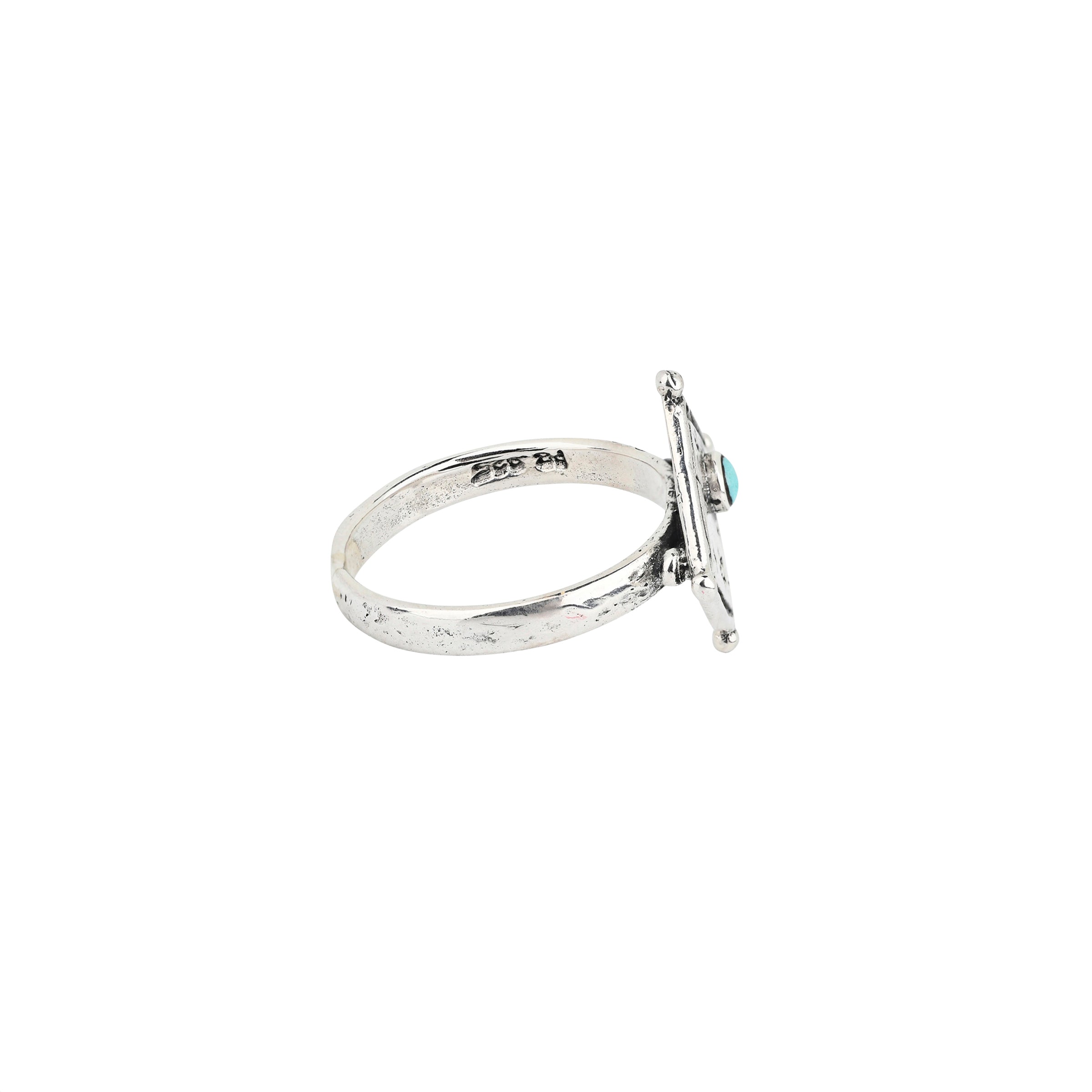 A darling Sterling Silver ring stamped with stars and adorned with a round Blue Turquoise