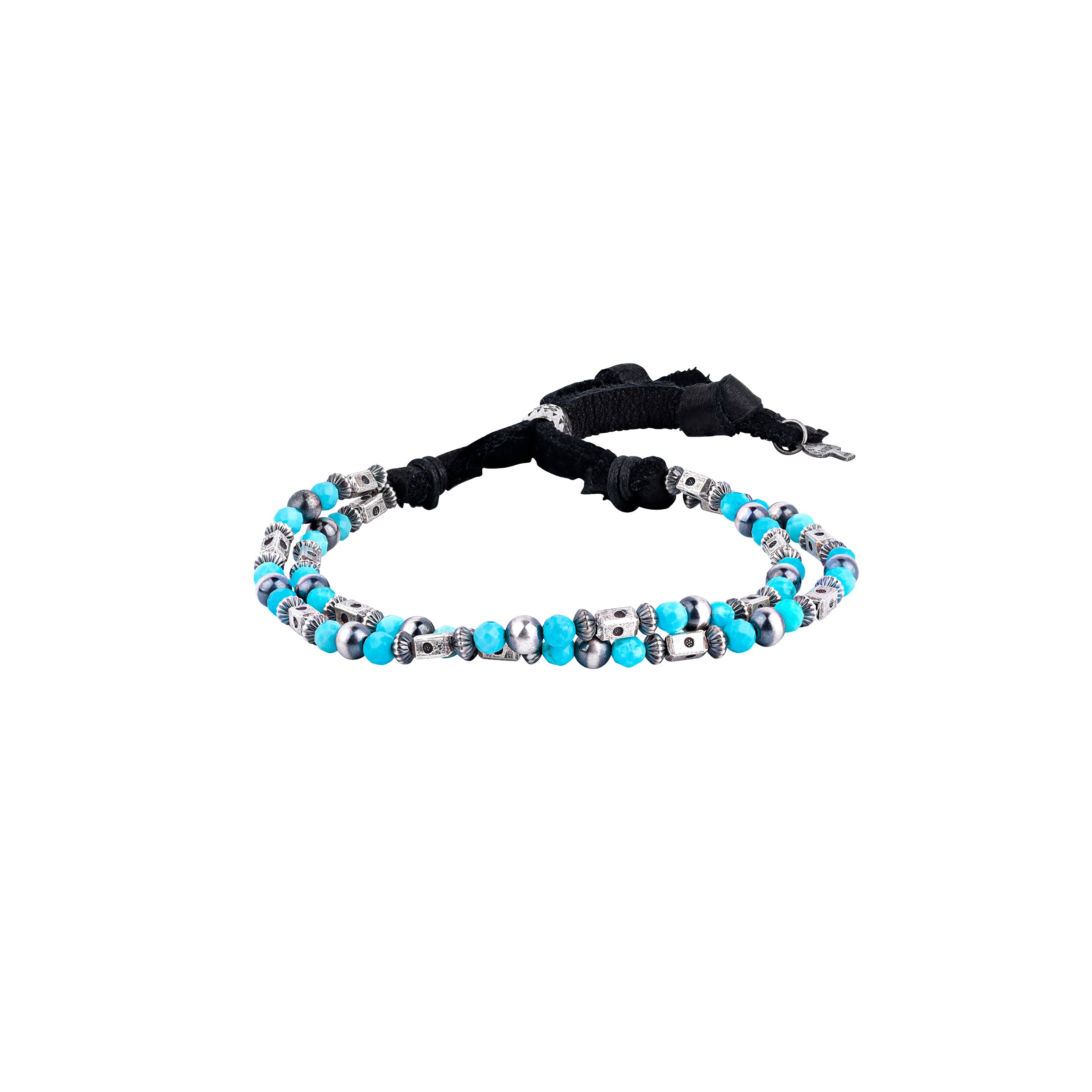 An adjustable bracelet featuring deerskin leather, desert pearls, sterling silver accents and beading, topped off with faceted turquoise