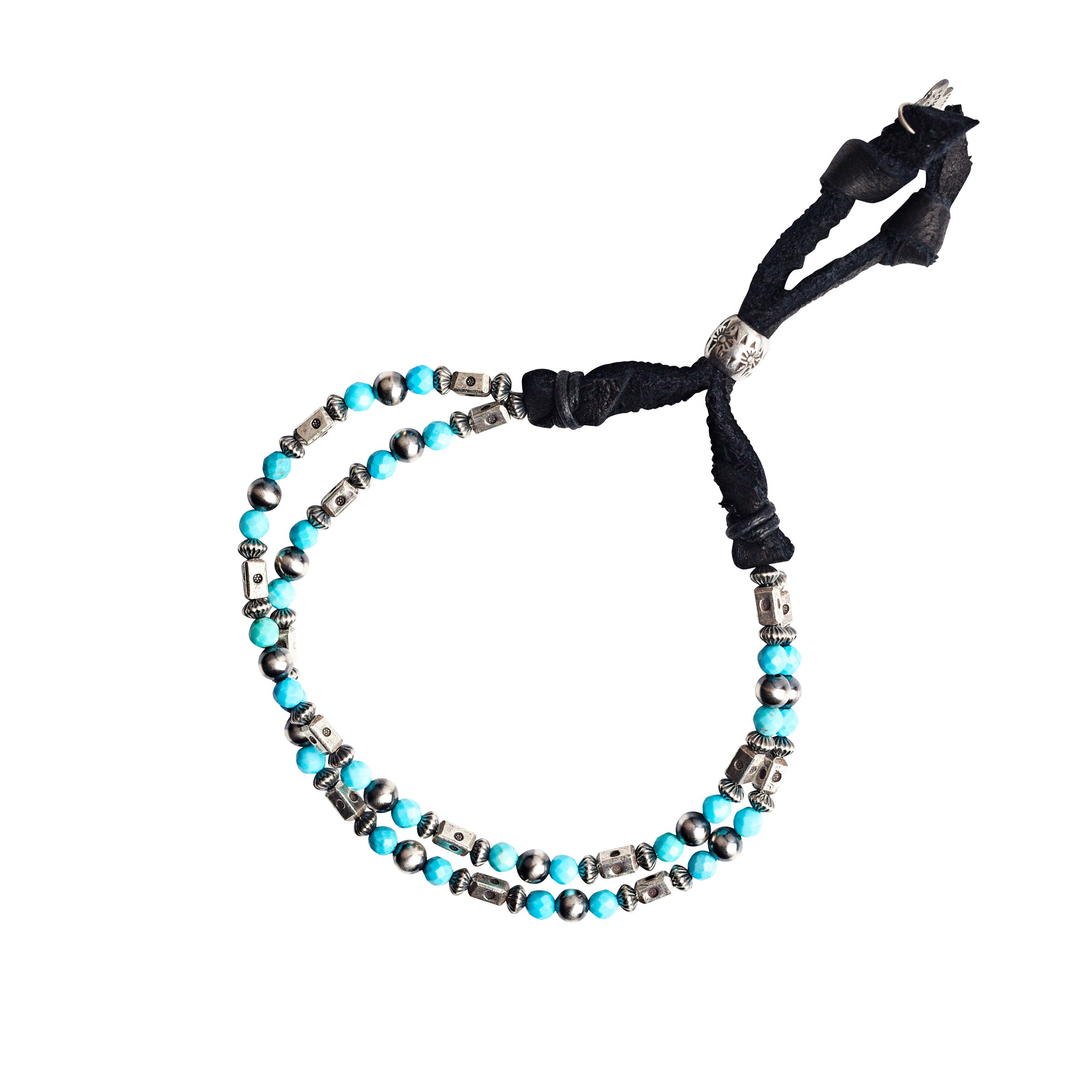 An adjustable bracelet featuring deerskin leather, desert pearls, sterling silver accents and beading, topped off with faceted turquoise