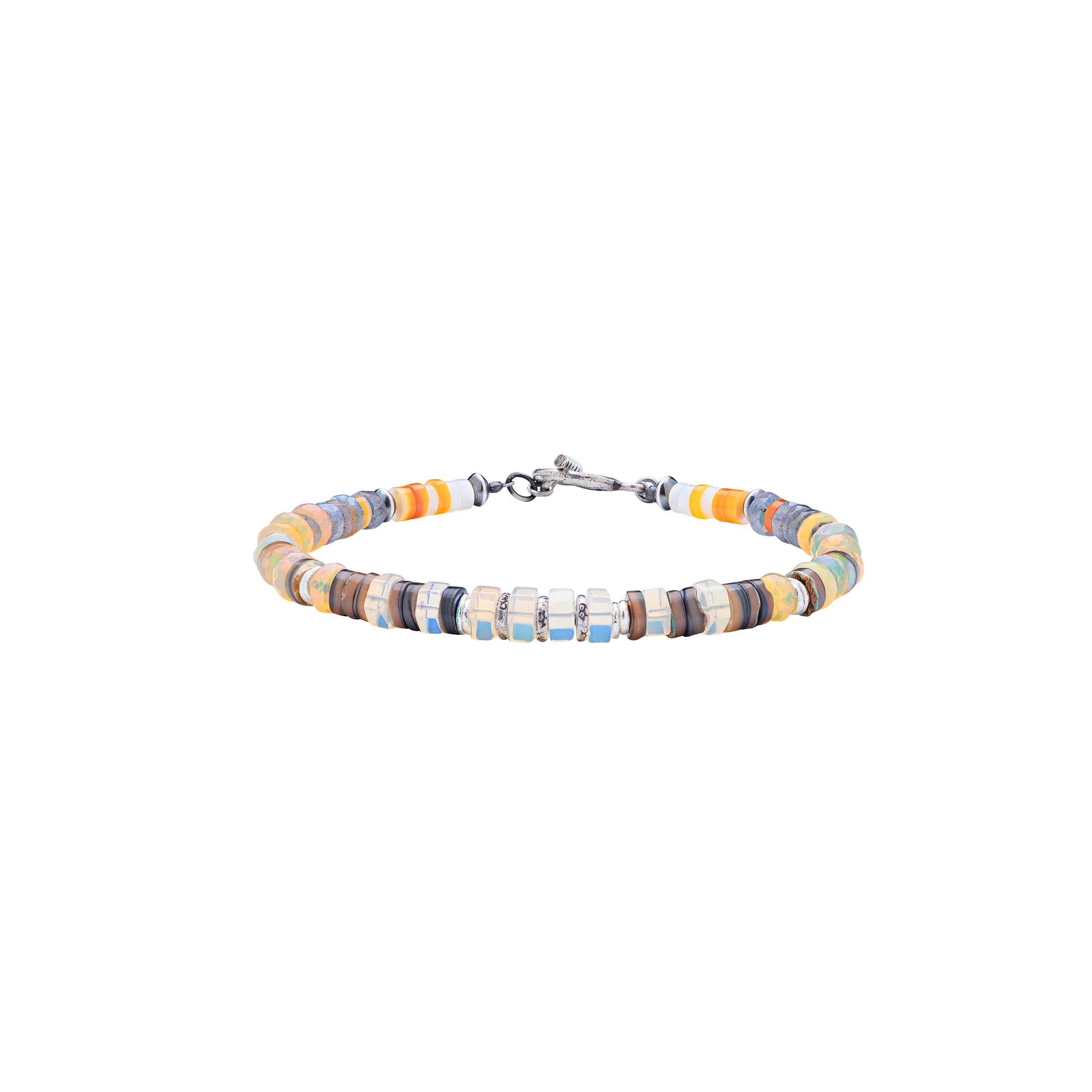 A Peyote Bird Original beaded bracelet strung with White Mother of Pearl, Yellow Mother of Pearl, Ethiopian Opals, Labradorite, and Abalone. This piece includes Desert Pearl Saucers and Thai Sterling Silver beading accents. Finished with a Sterling Silver bar and hoop toggle.