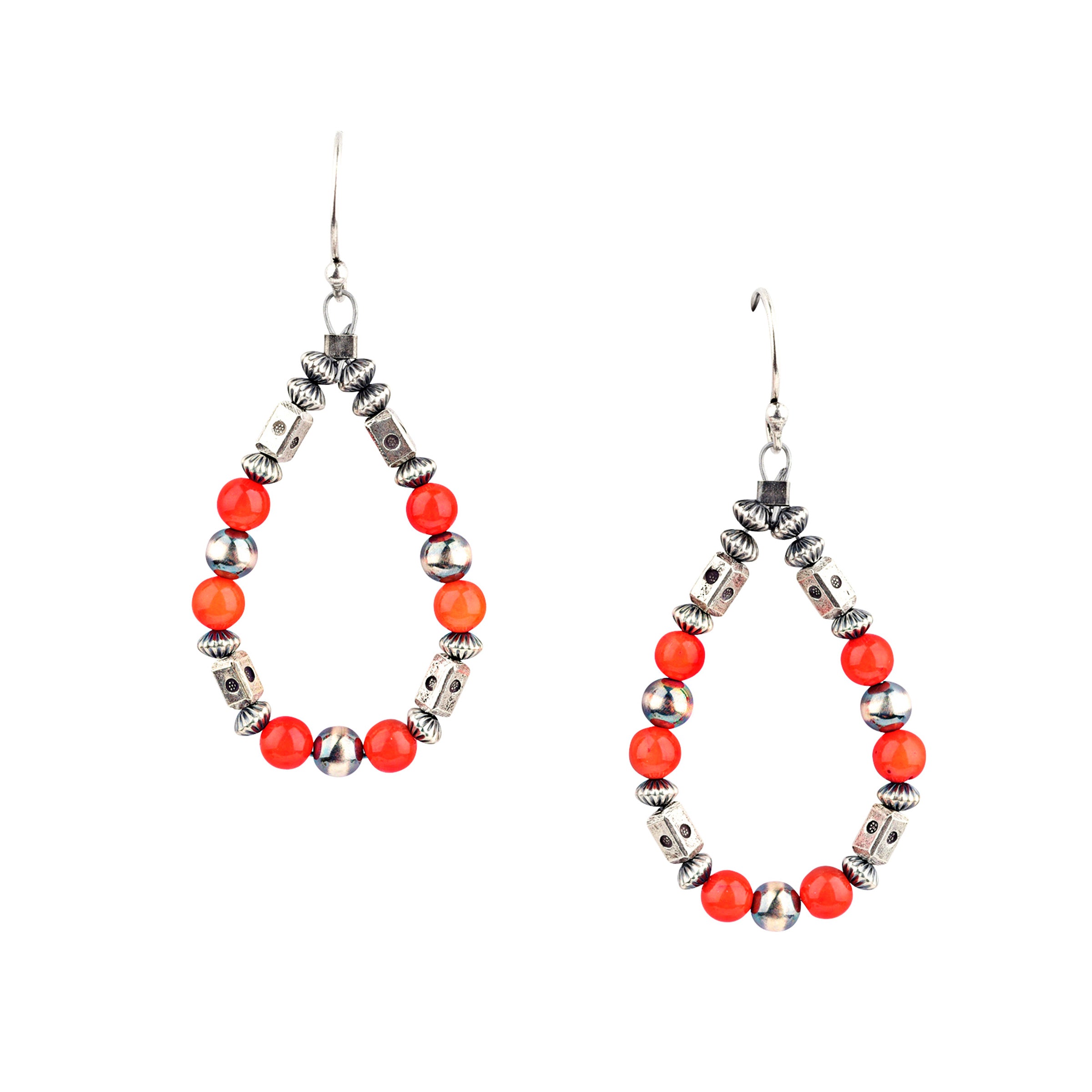 Our O'Keeffe Earrings are adorned with desert pearls, sterling silver embellishments, and your choice of coral, pearl, or turquoise beading, or stick with just sterling silver!