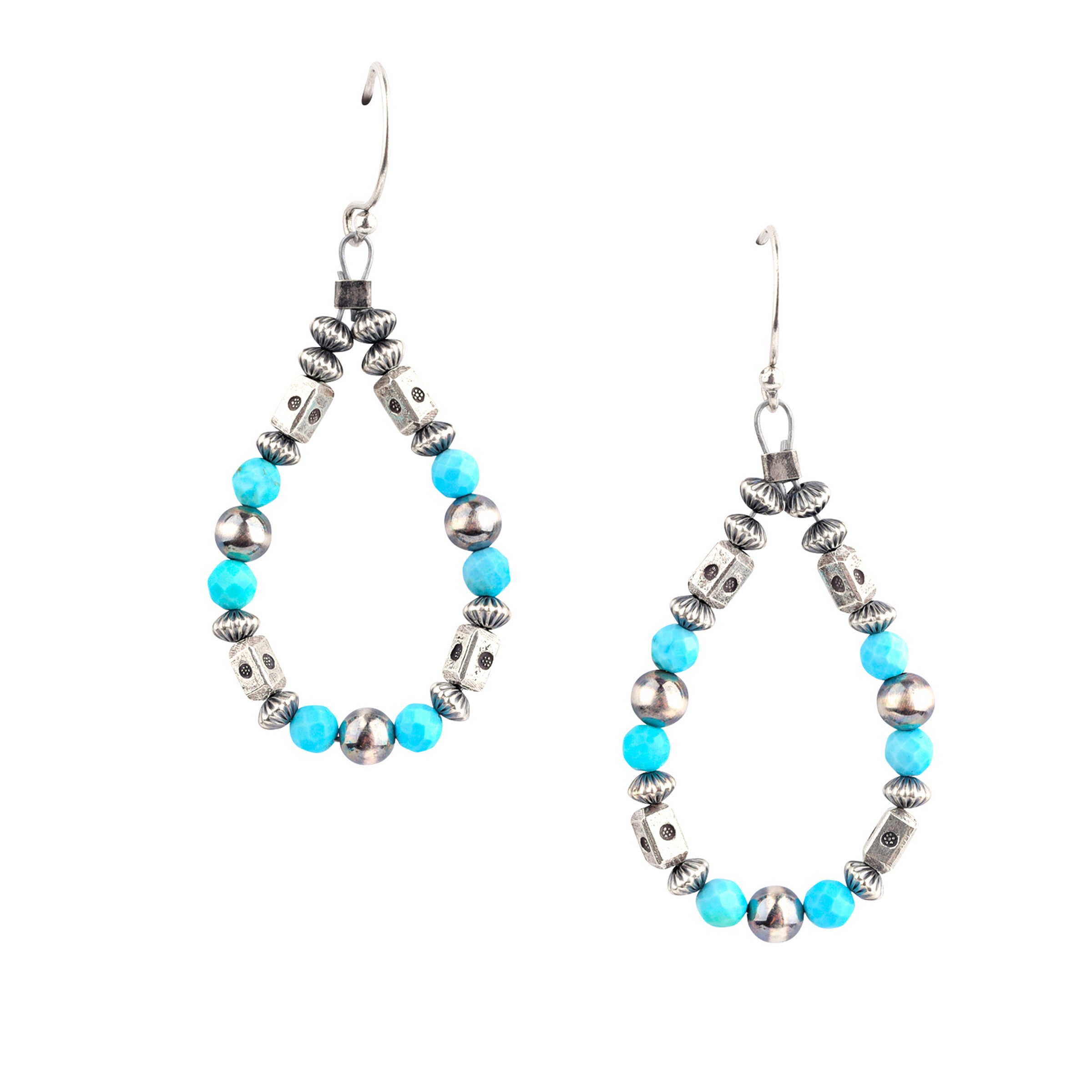 Our O'Keeffe Earrings are adorned with desert pearls, sterling silver embellishments, and your choice of coral, pearl, or turquoise beading, or stick with just sterling silver!