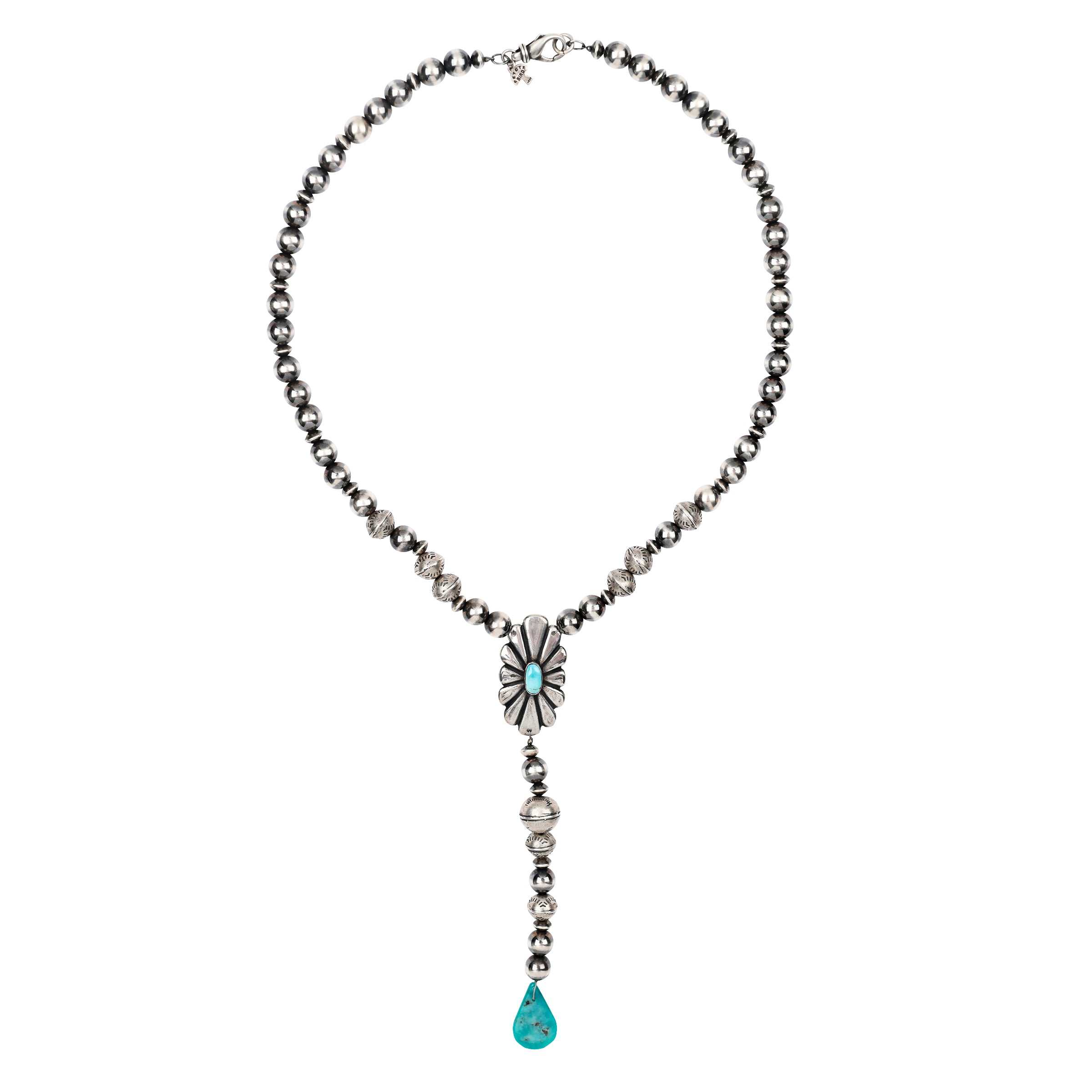 A Sundance staple piece - this y-neck necklace is made with Sterling Silver featuring a large Concho piece with Turquoise accents strung with Desert Pearls and vintage-style stamped Sterling Silver beading.