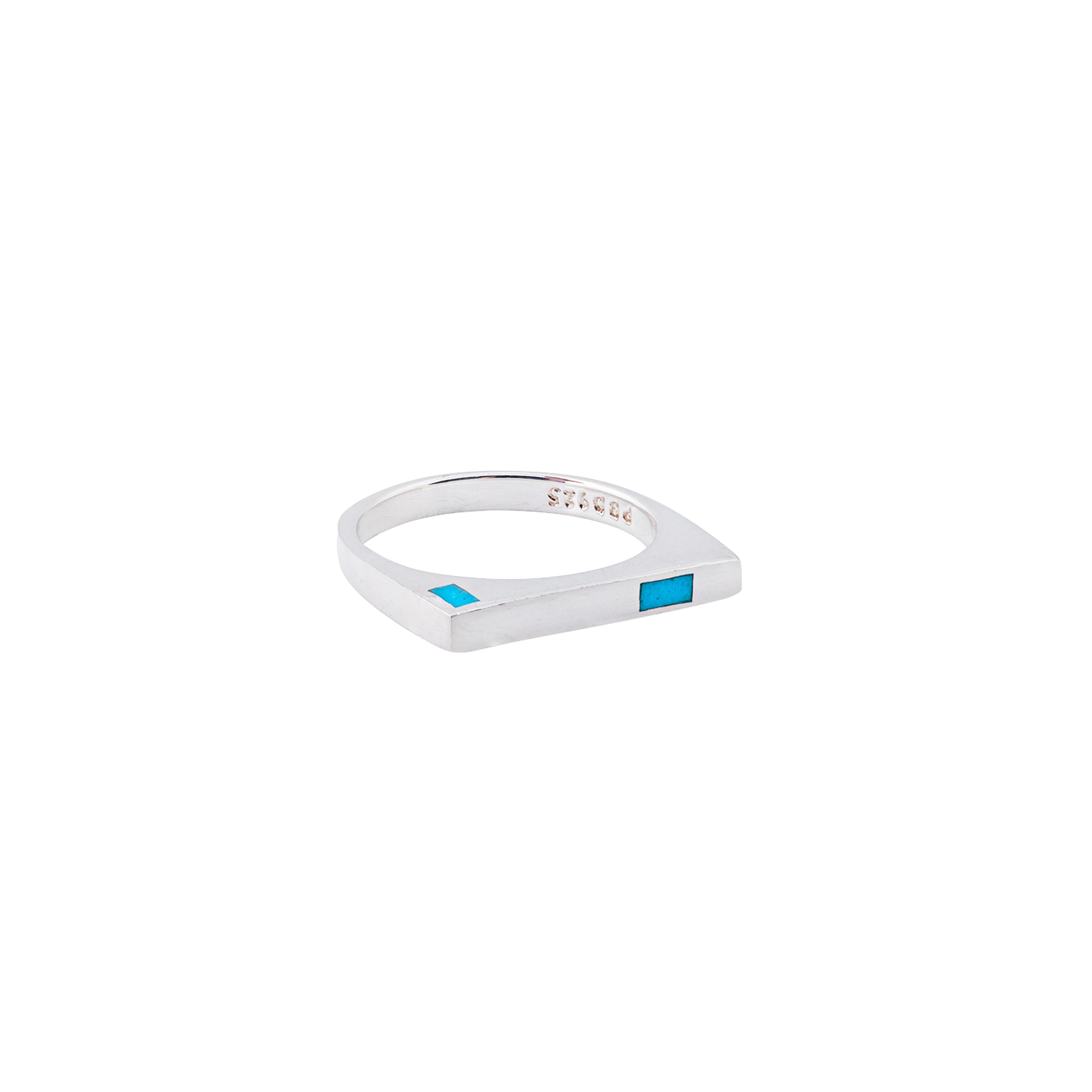 A sleek design of Sterling Silver and Blue Turquoise. A simple square ring perfect for stacking