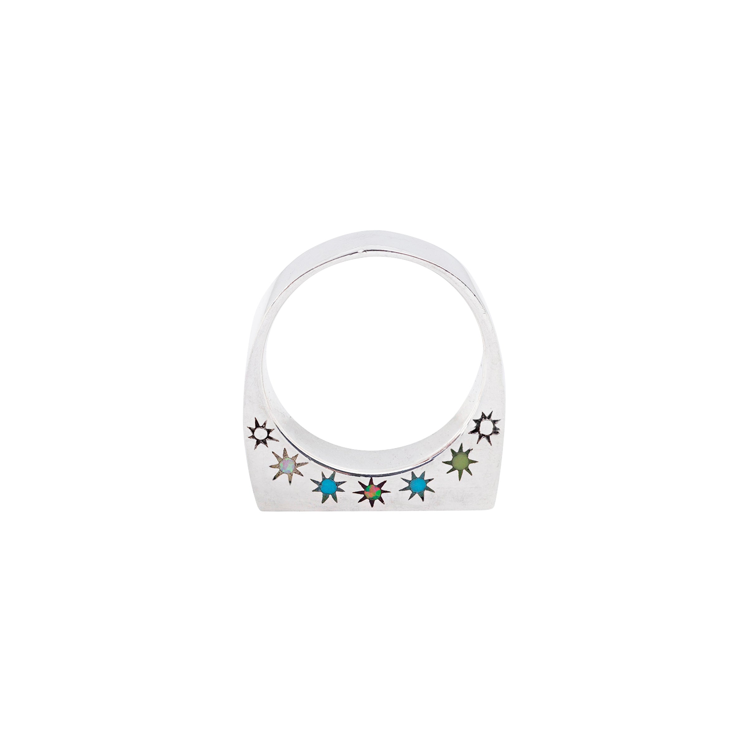 A Sterling Silver ring inlayed with Green Turquoise, Blue Turquoise, White Opal and Purple Opal. .A bar of turquoise sets the mood on top while stars adorn the sides.