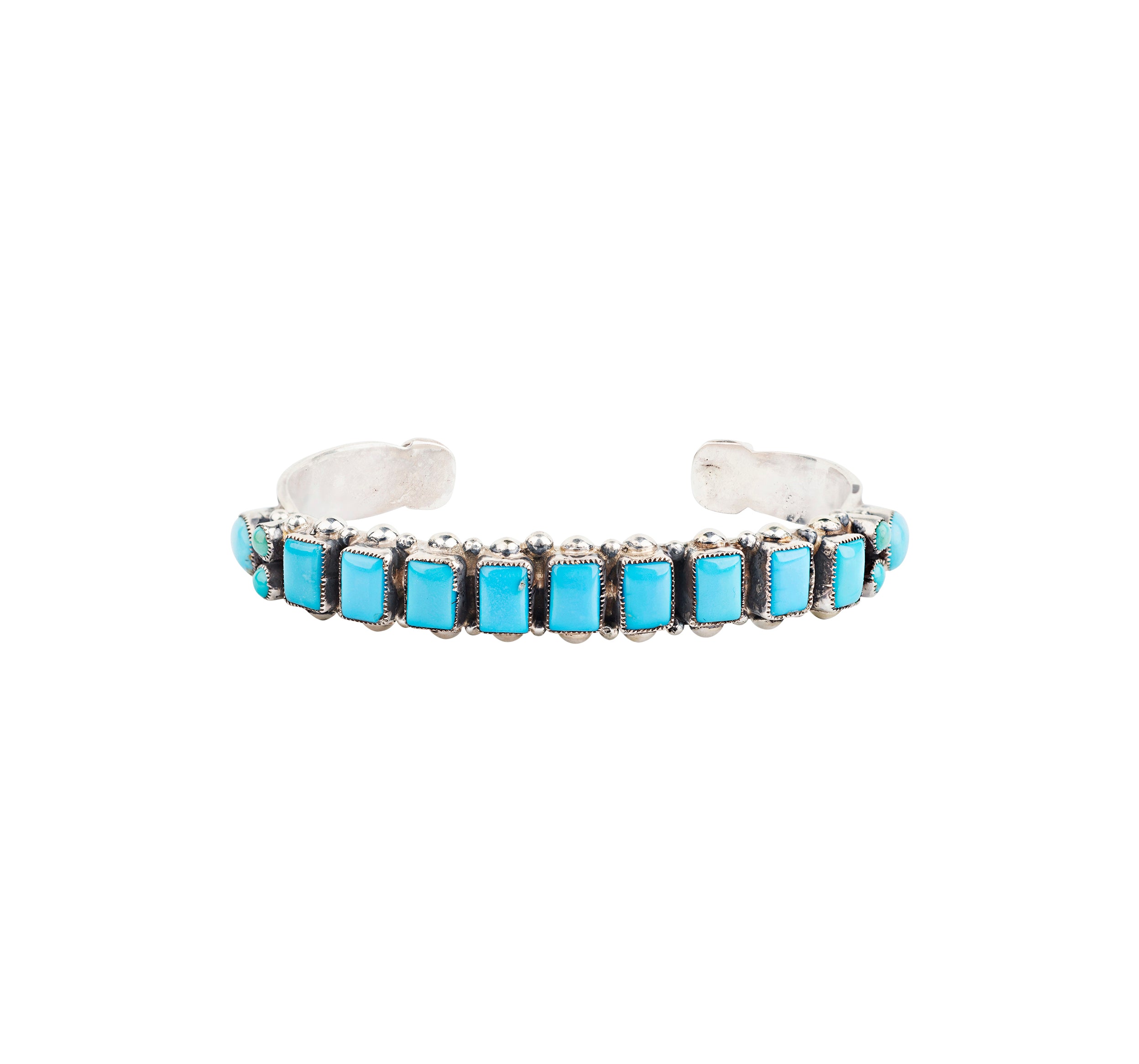 Sterling silver cuff bracelet with Sleeping Beauty Turquoise from artist Leo Feeney. Made in the USA.