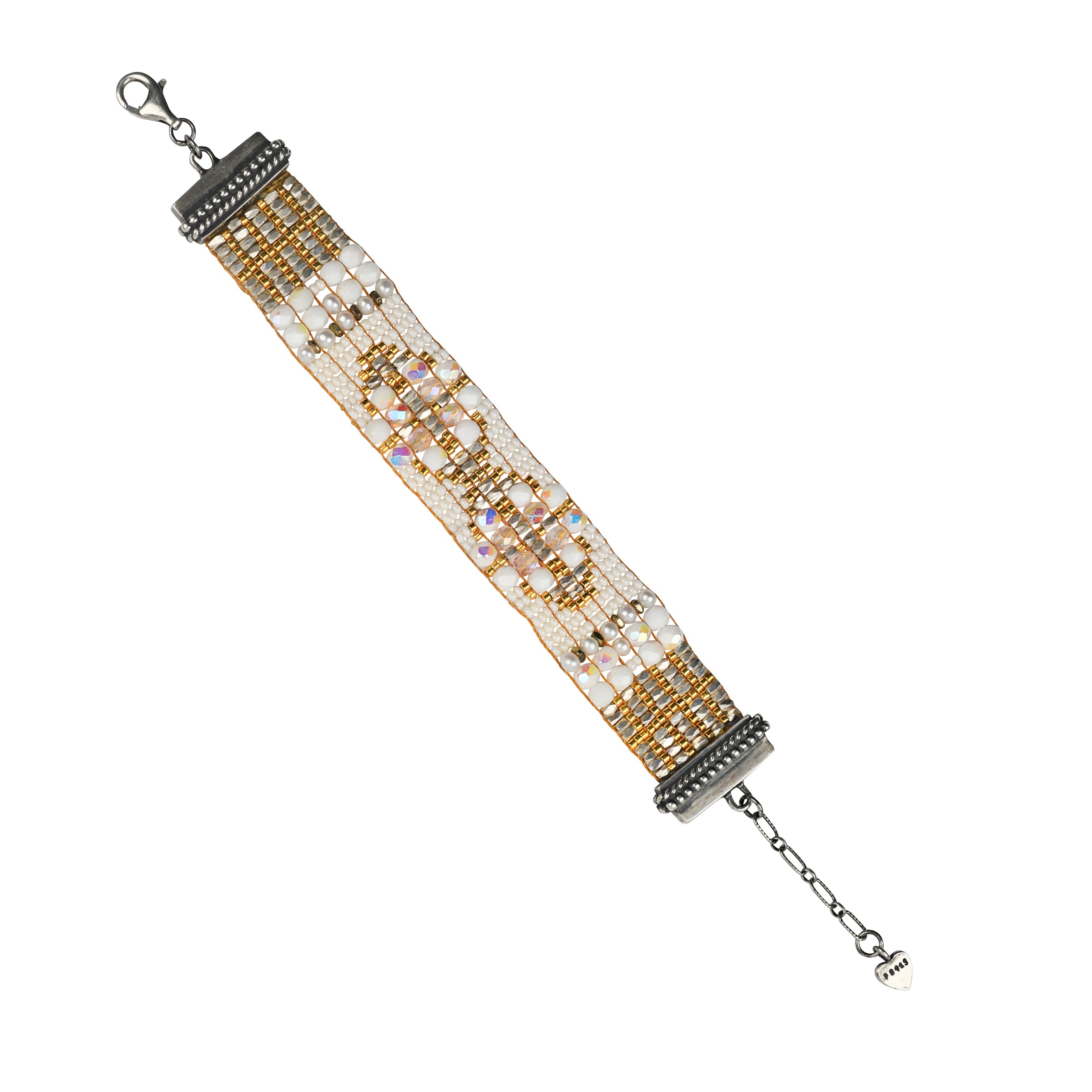 Hand woven by Adonnah Langer, this beautiful beaded bracelet is strung in a geometric pattern with metallic hues of white, gold and silver topped with pearls