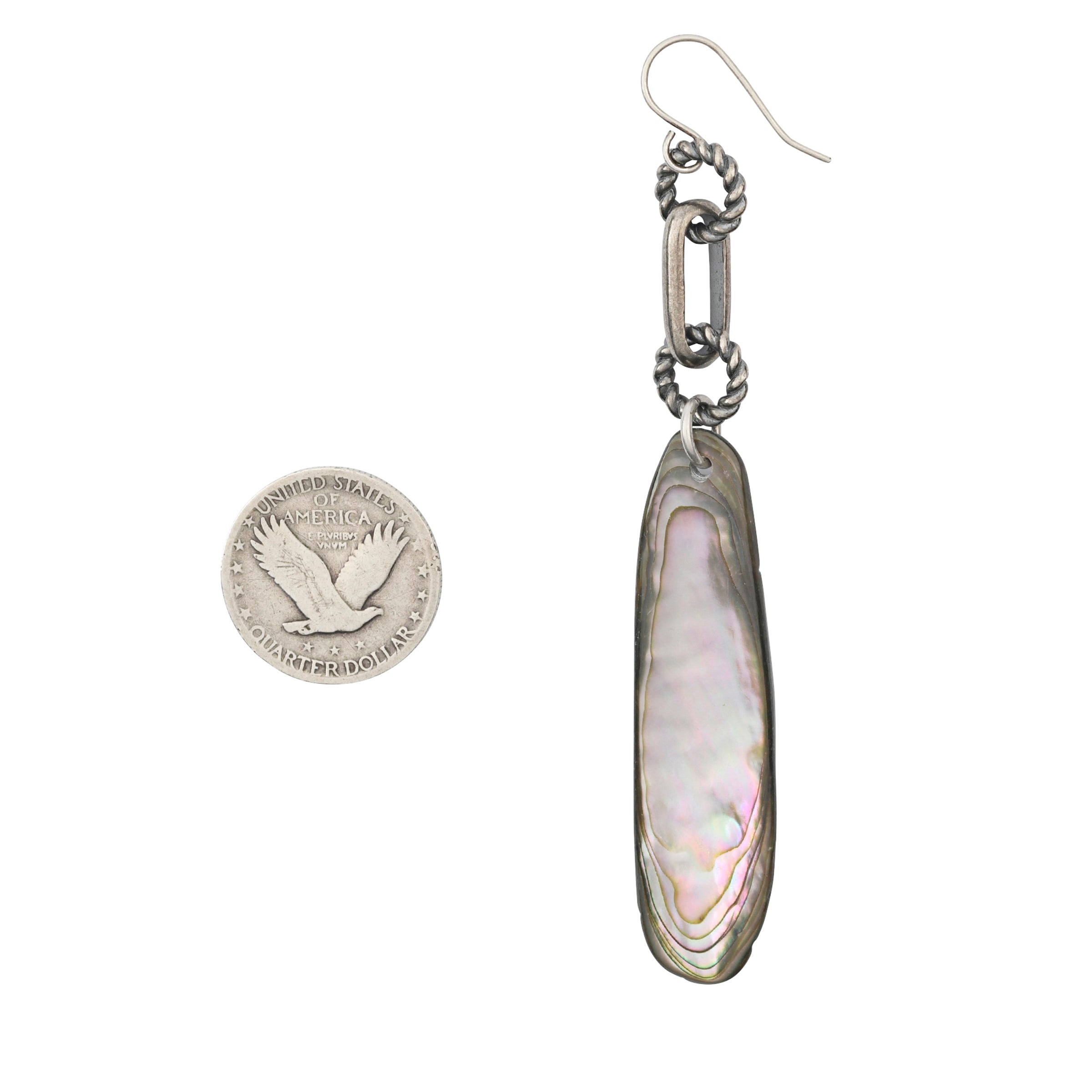 Sterling silver ear wire suspend large textured circular and oval chain over Abalone oval stone earring next to coin for scale.