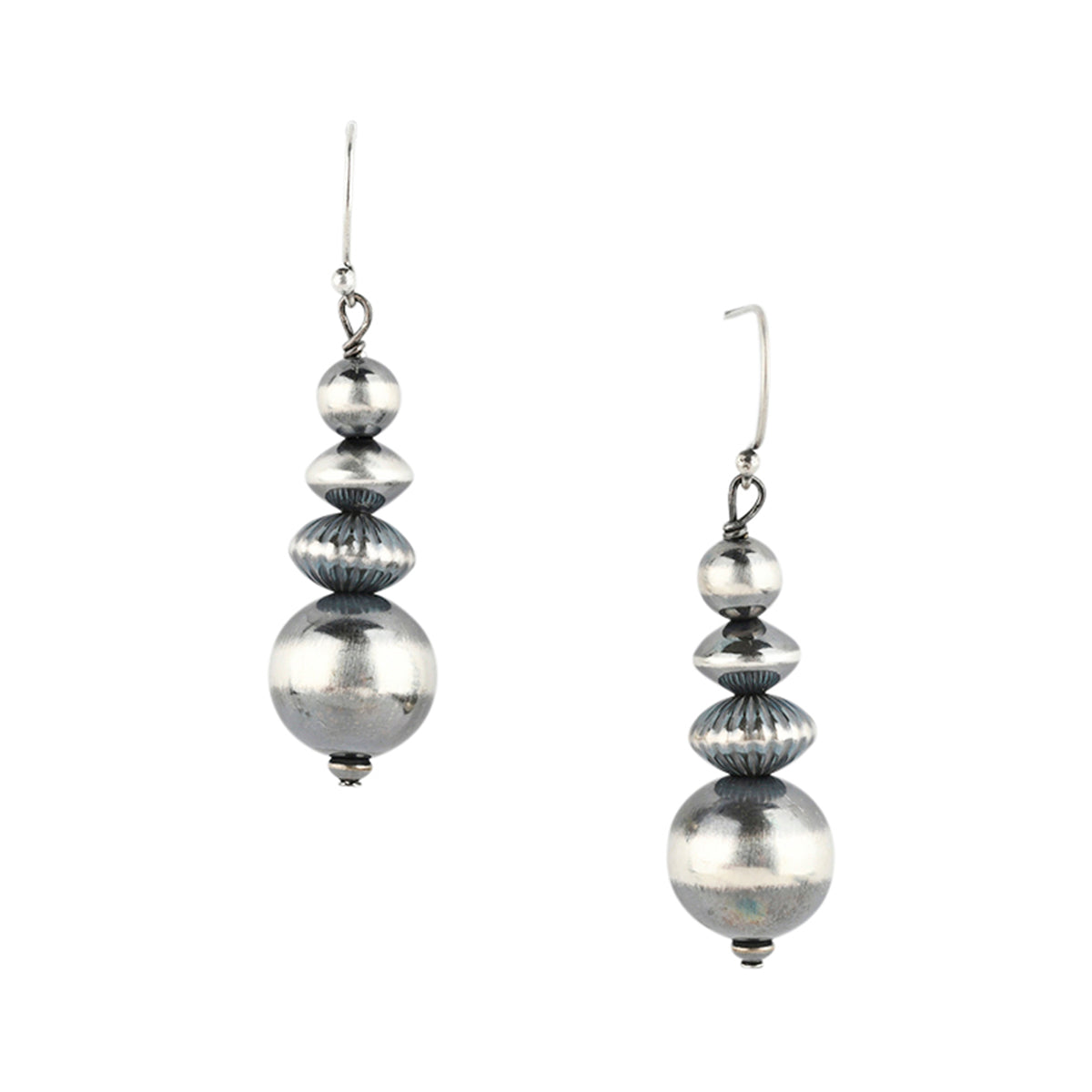 Stacked beaded sterling silver bead earrings suspended on silver ear wires