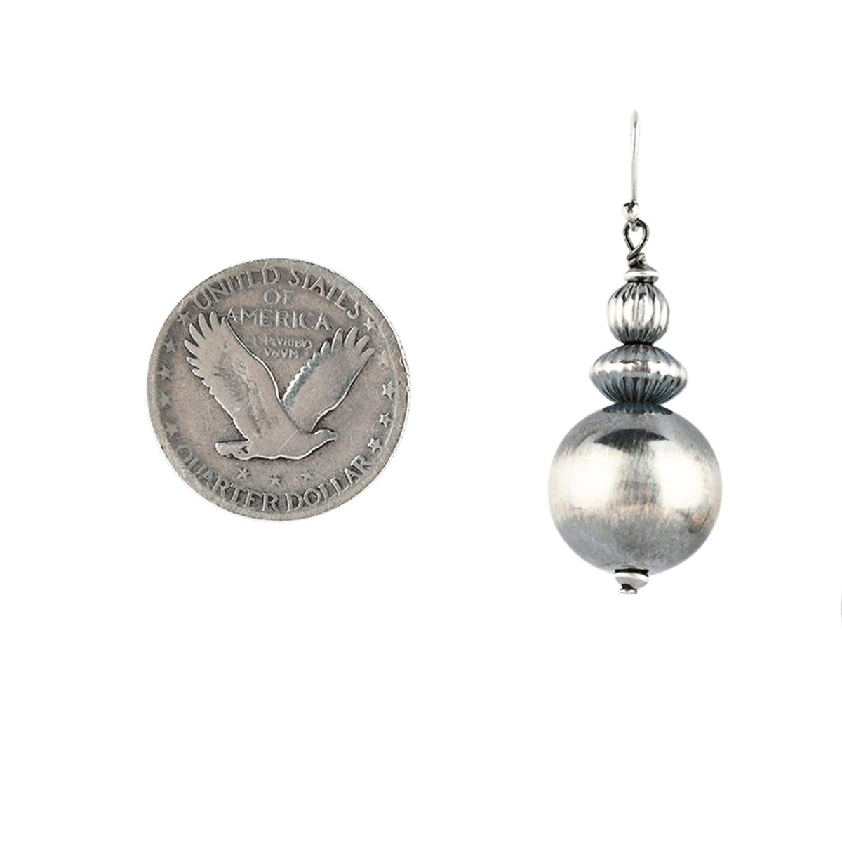 Large Sterling Silver Bead Earring with textured beads on top next to coin for scale