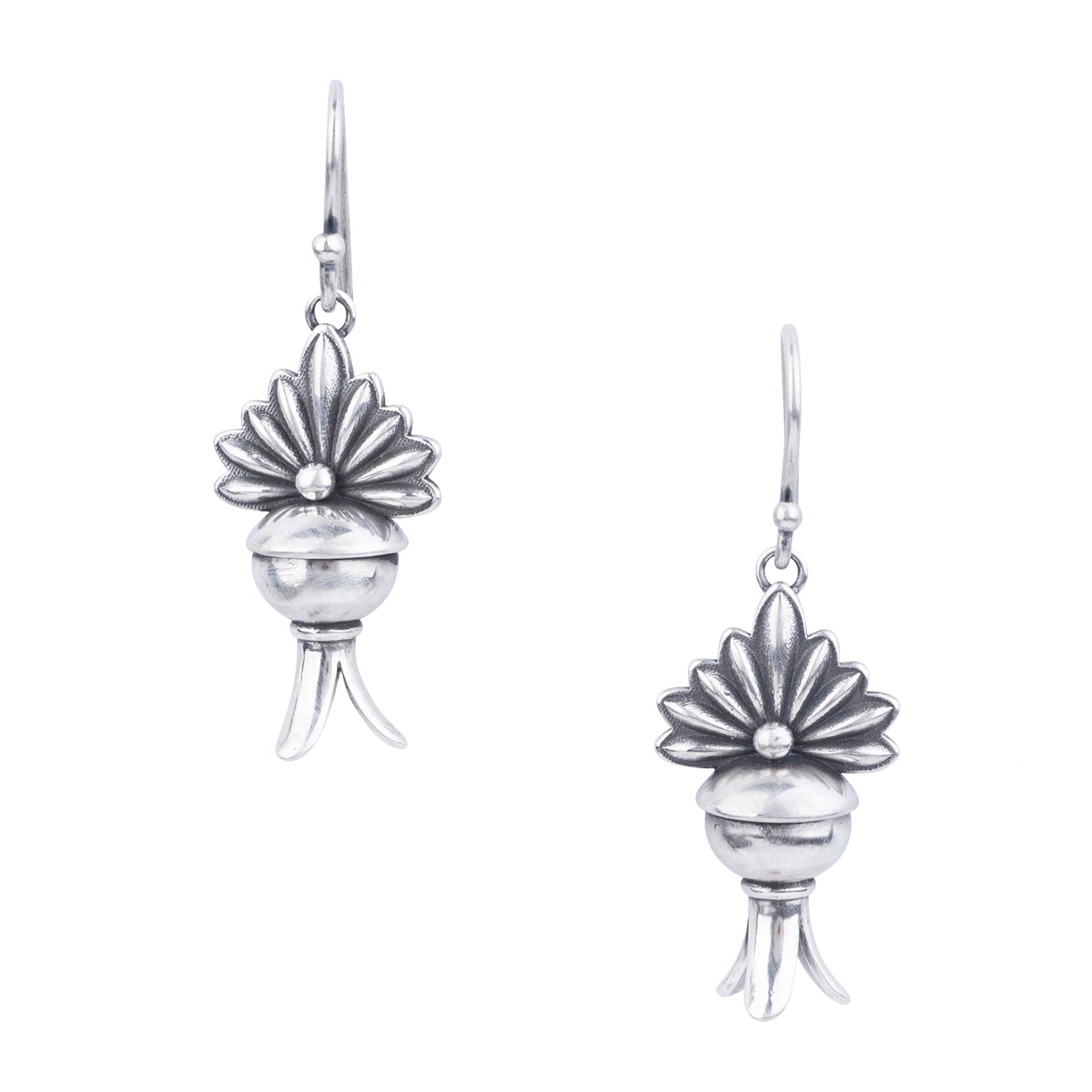 These beautifully designed Sterling Silver squash blossom earrings from Dennis Hogan, are the perfect Southwestern addition to any outfit.