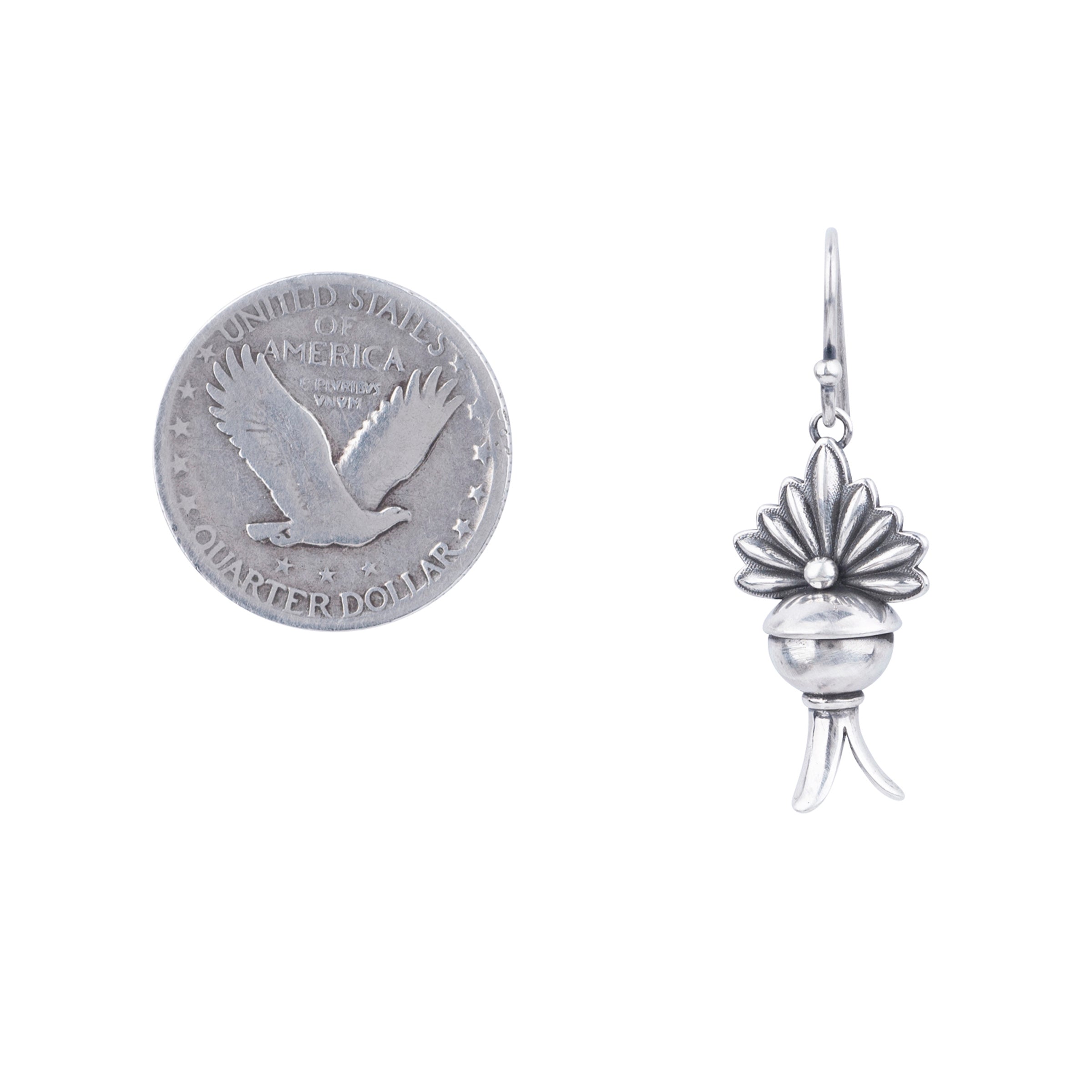 These beautifully designed Sterling Silver squash blossom earrings from Dennis Hogan, are the perfect Southwestern addition to any outfit.