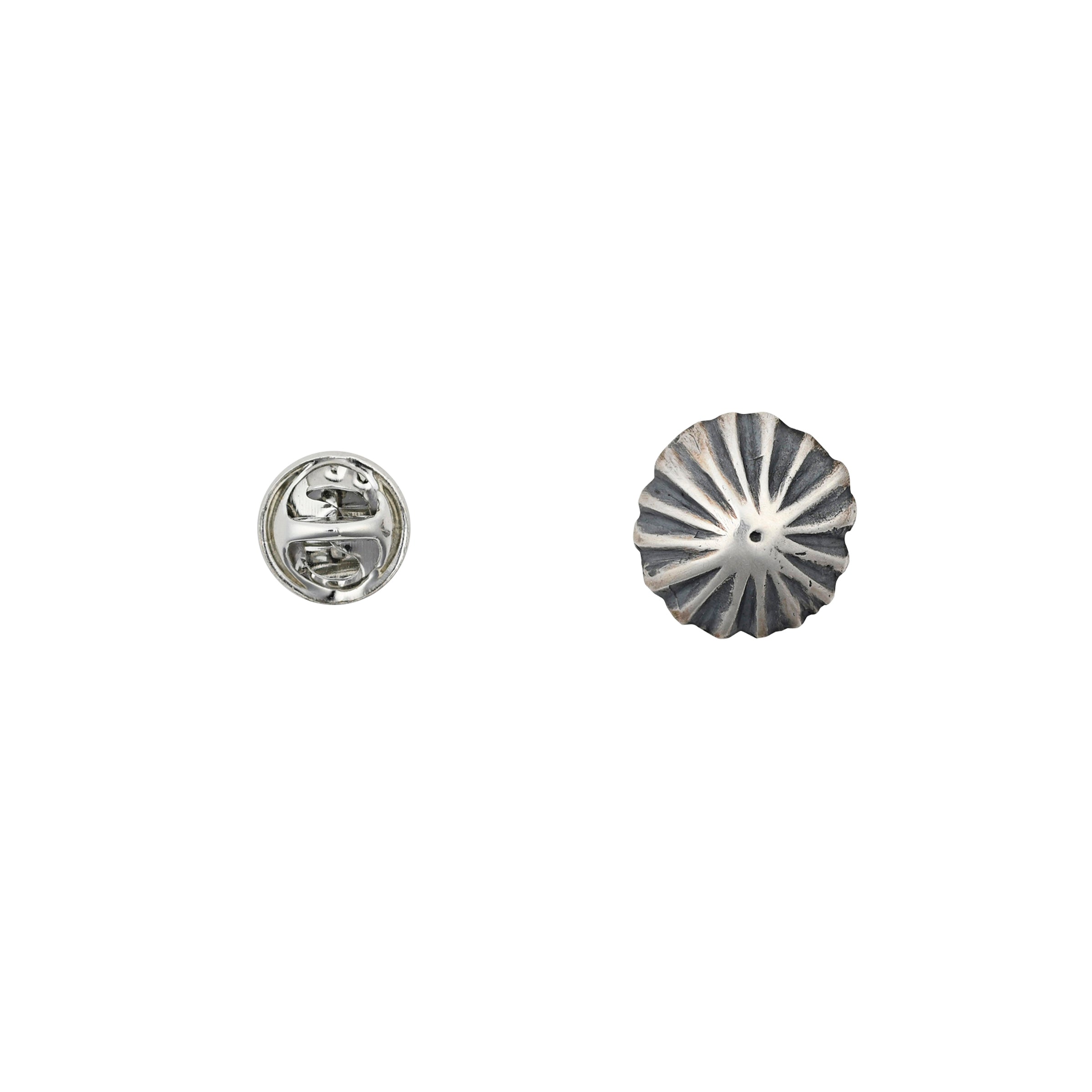 Sterling silver hat pin in the shape of a concho.