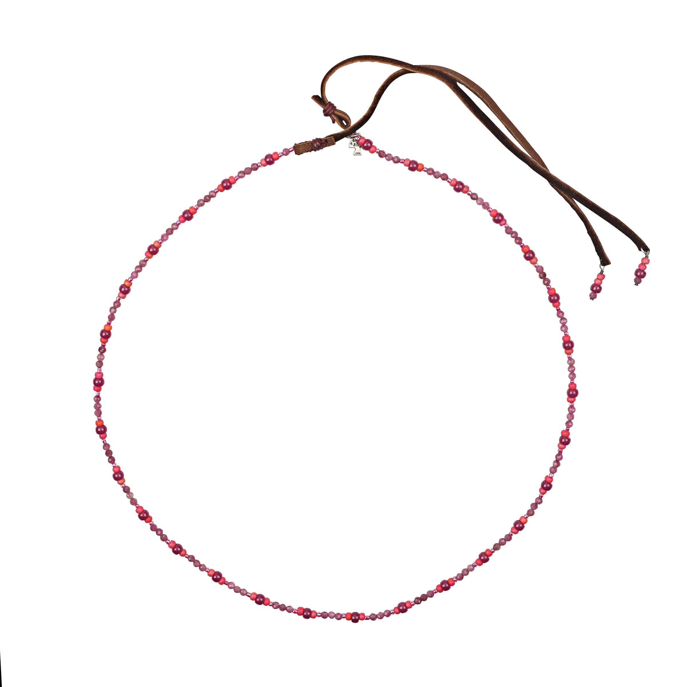 Pink toned beaded hatband with ruby and pink tourmaline accents with deerskin leather ties and charms at end of leather with peyote bird hangtag