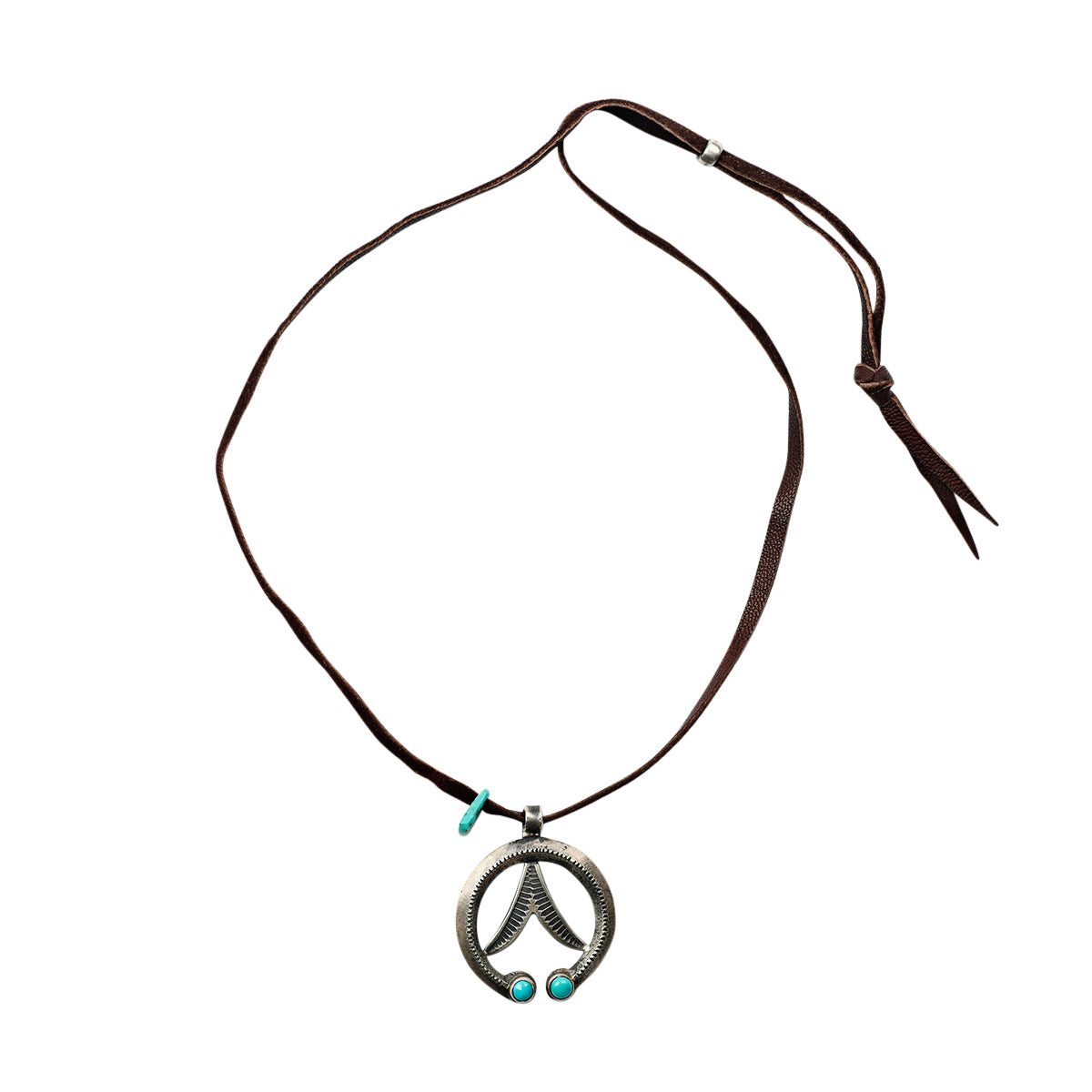 A timeless take on a Naja Necklace featuring Blue Turquoise with Blue Turquoise accent beading strung on soft deerskin leather.