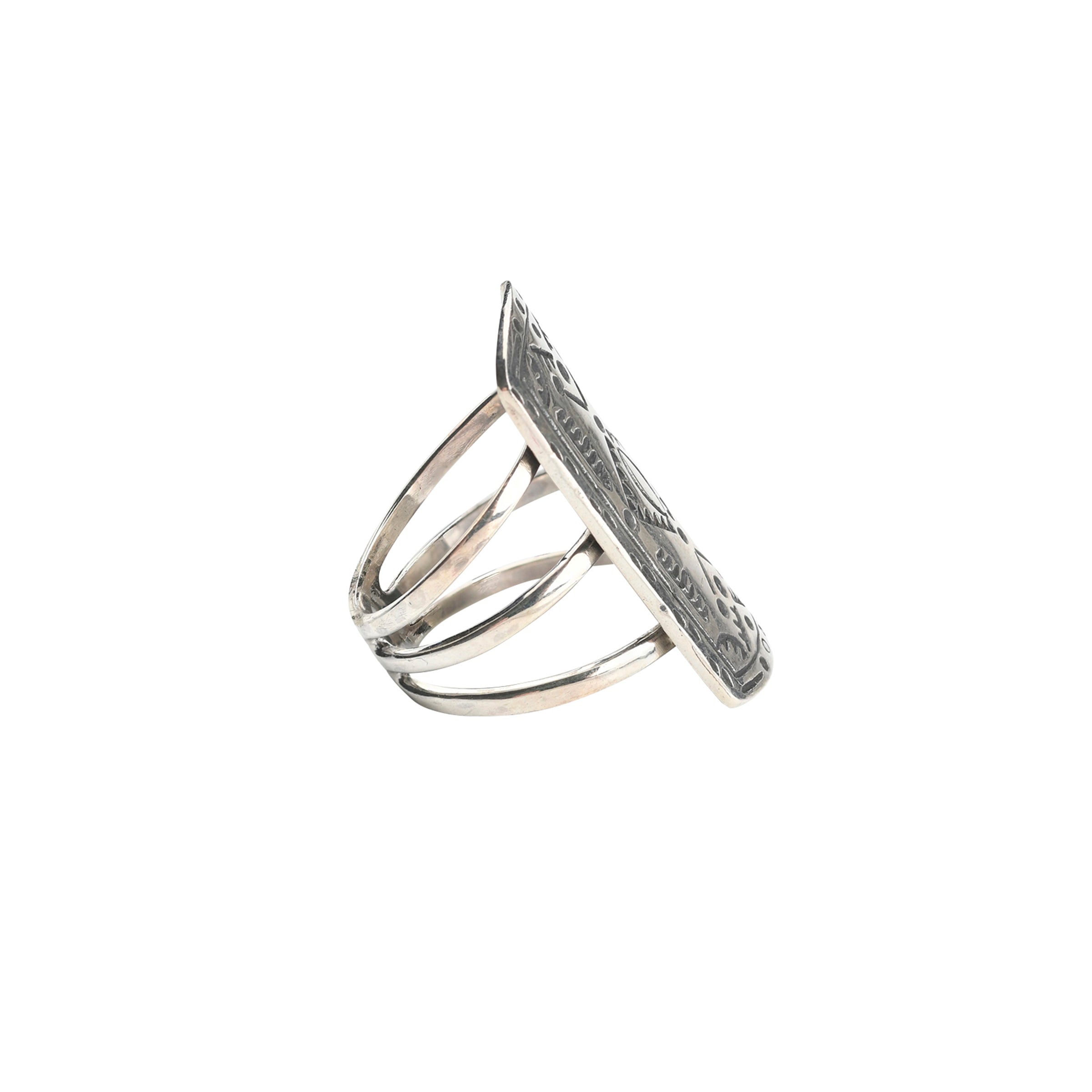 A timeless stamped Sterling Silver shield ring with Southwestern motif detailing