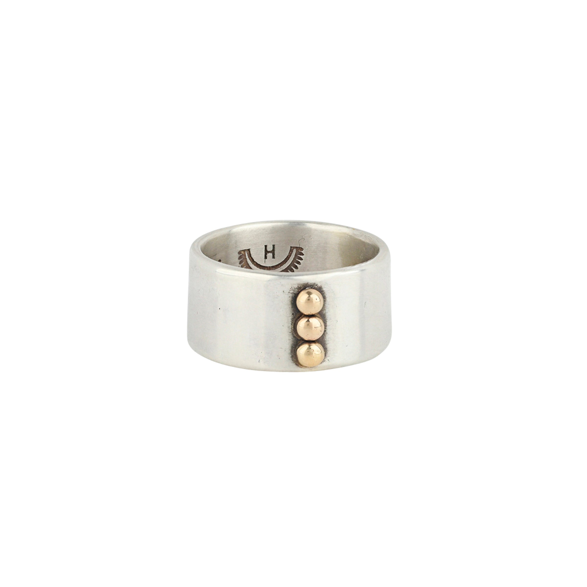 Sterling Silver ring featuring three gold studs handcrafted by Dennis Hogan
