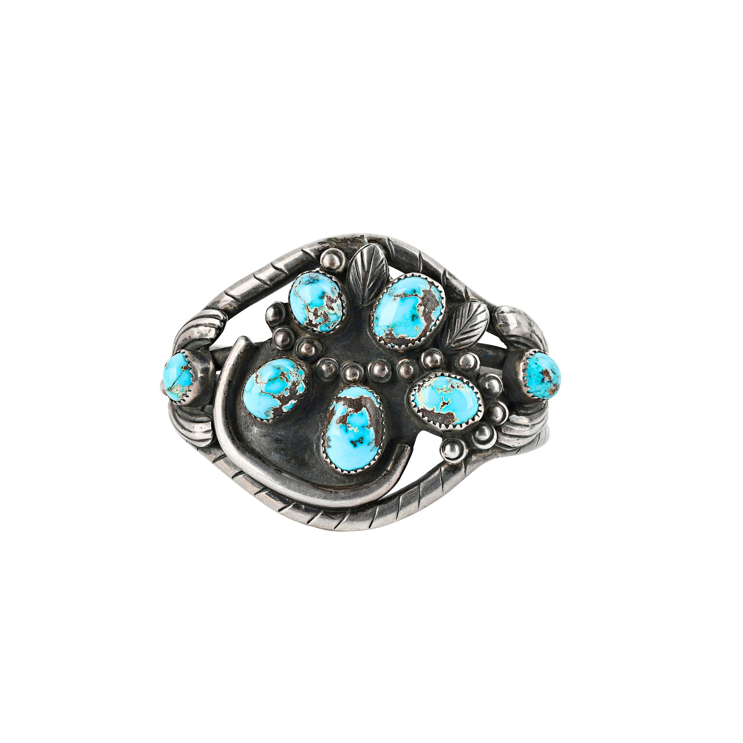 Vintage Navajo sterling silver cuff featuring Persian turquoise stones in a bold 1950's Southwestern design