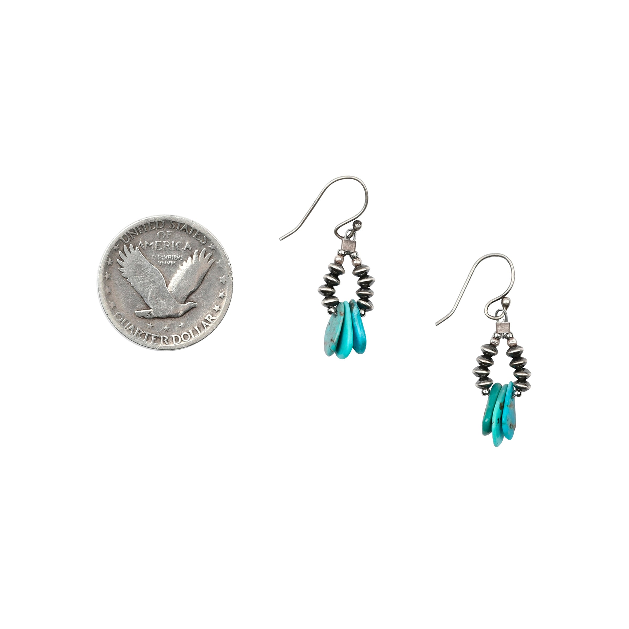 Small sterling silver hoop earrings on fine ear wires with silver saucer beads and 3 turquoise tabs in center next to coin for scale.